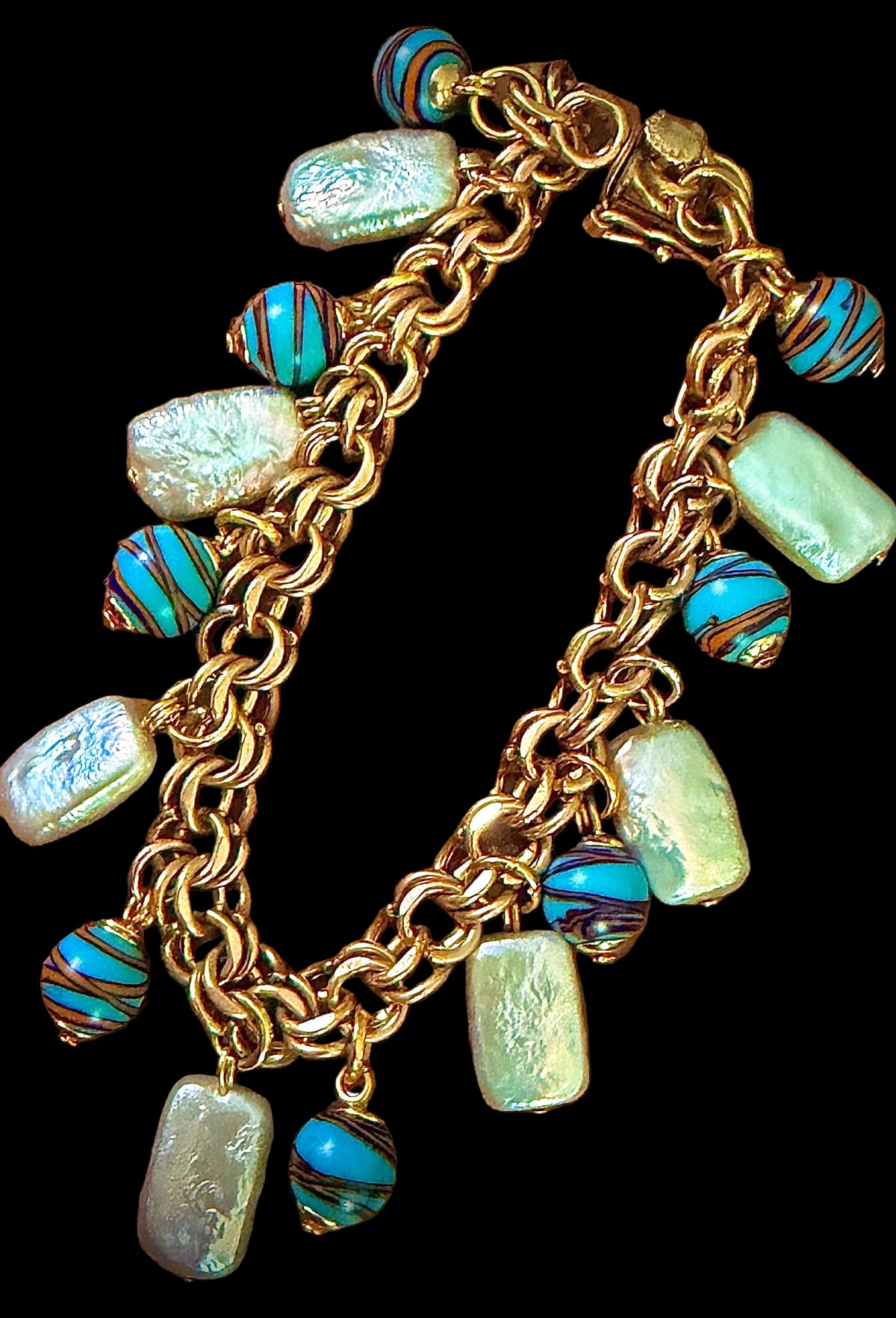 One of a kind 12k GF 1950’s Charm Bracelet Adorned With Rectangular White Freshwater Pearls & Ercole Moretti Aqua Ribbon Beads