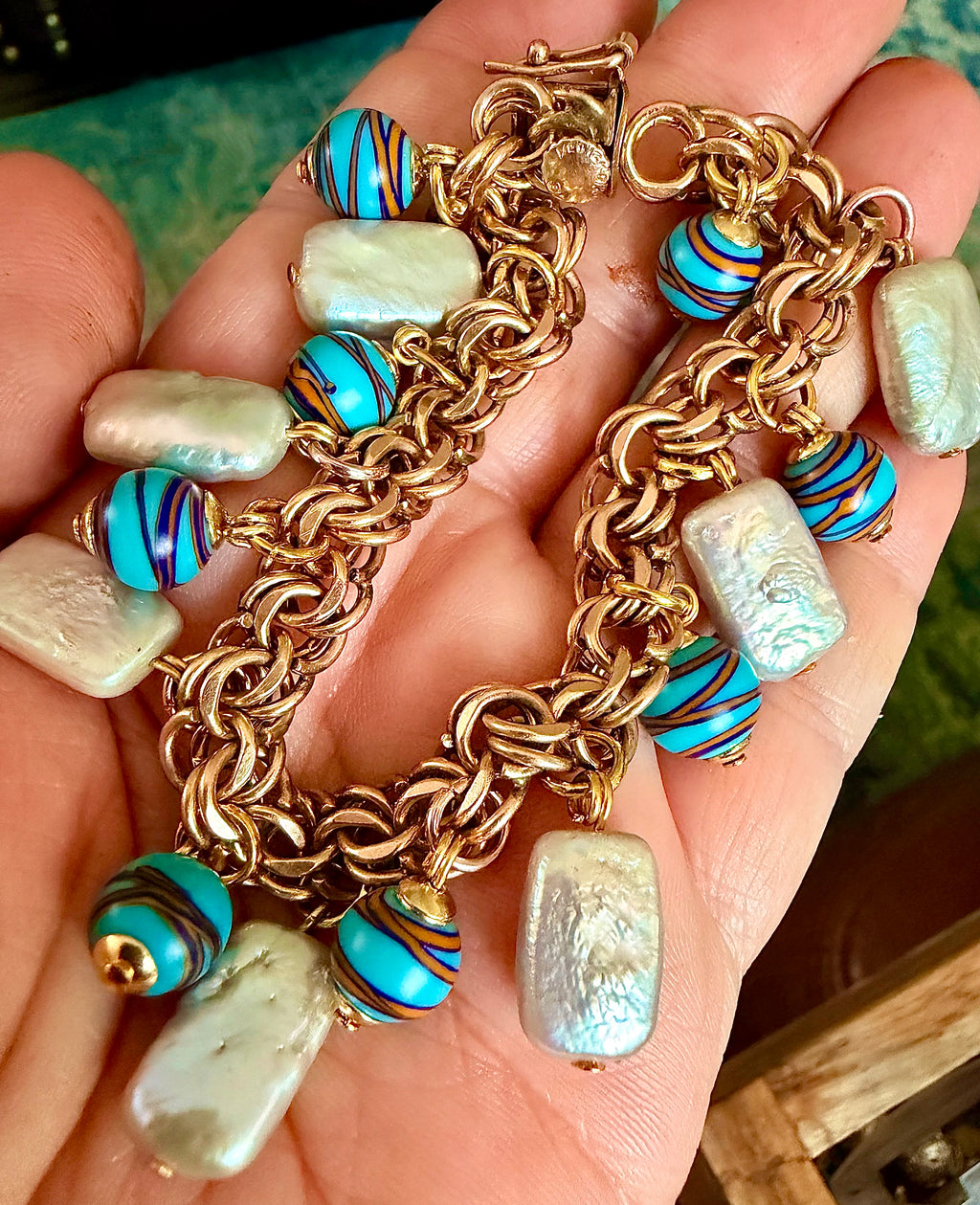 One of a kind 12k GF 1950’s Charm Bracelet Adorned With Rectangular White Freshwater Pearls & Ercole Moretti Aqua Ribbon Beads