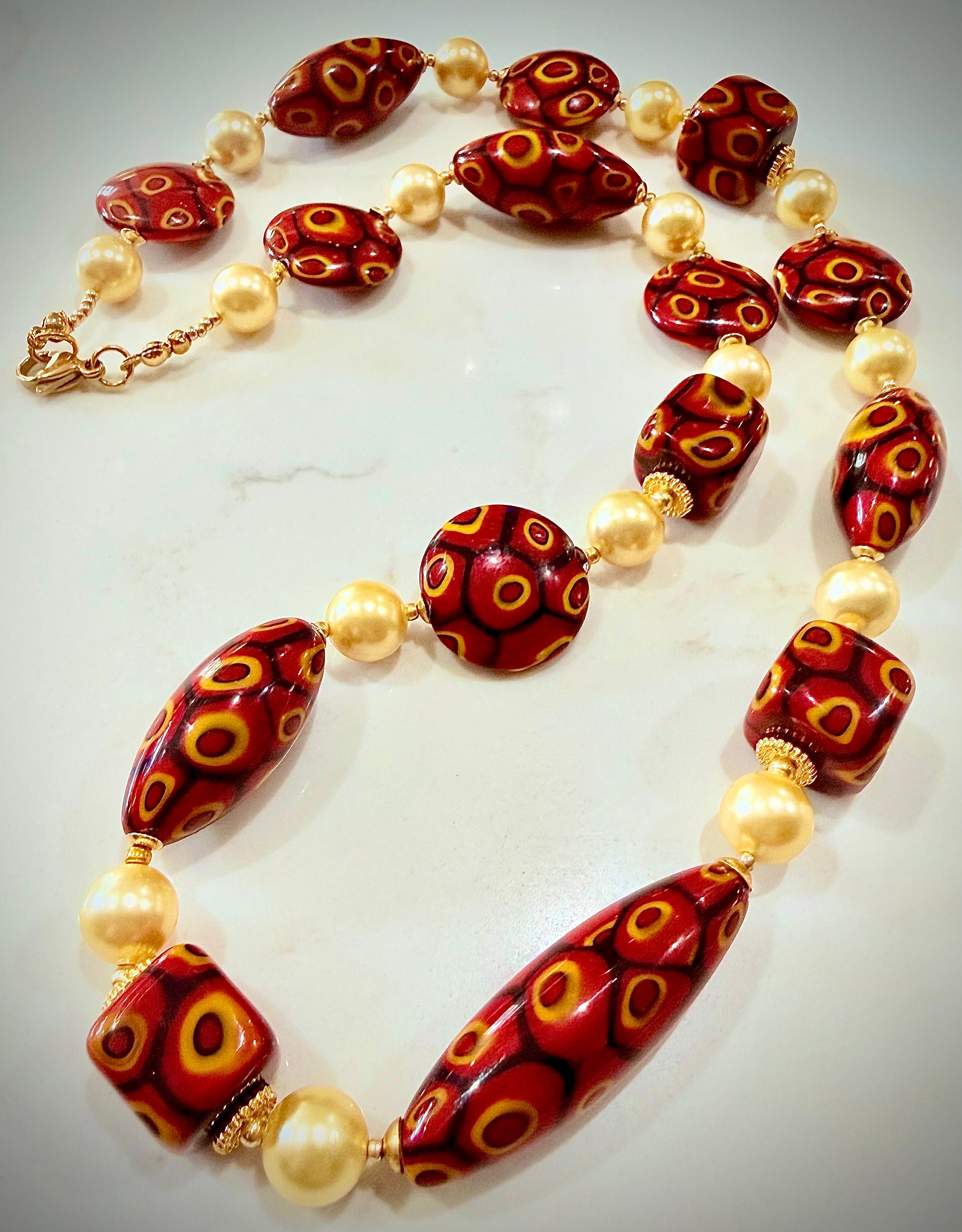 Rosario Leonardi Golden Shell Pearl With Moretti Red, Yellow & Black Beaded Necklace