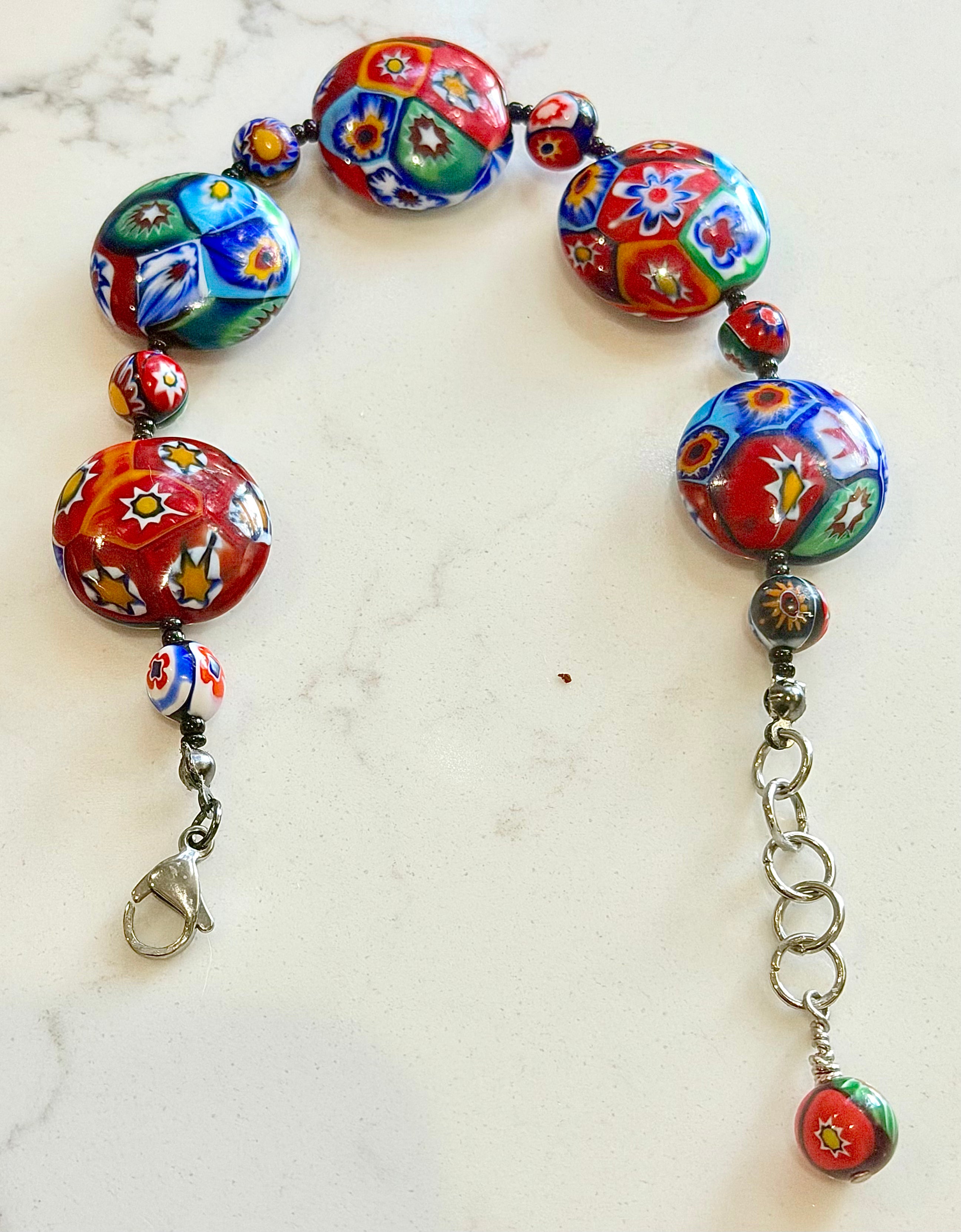 Rosario Leonardi Beaded Coin Shaped Bracelet Featuring Ercole Moretti Red & Blue Flower Patterned  Beads