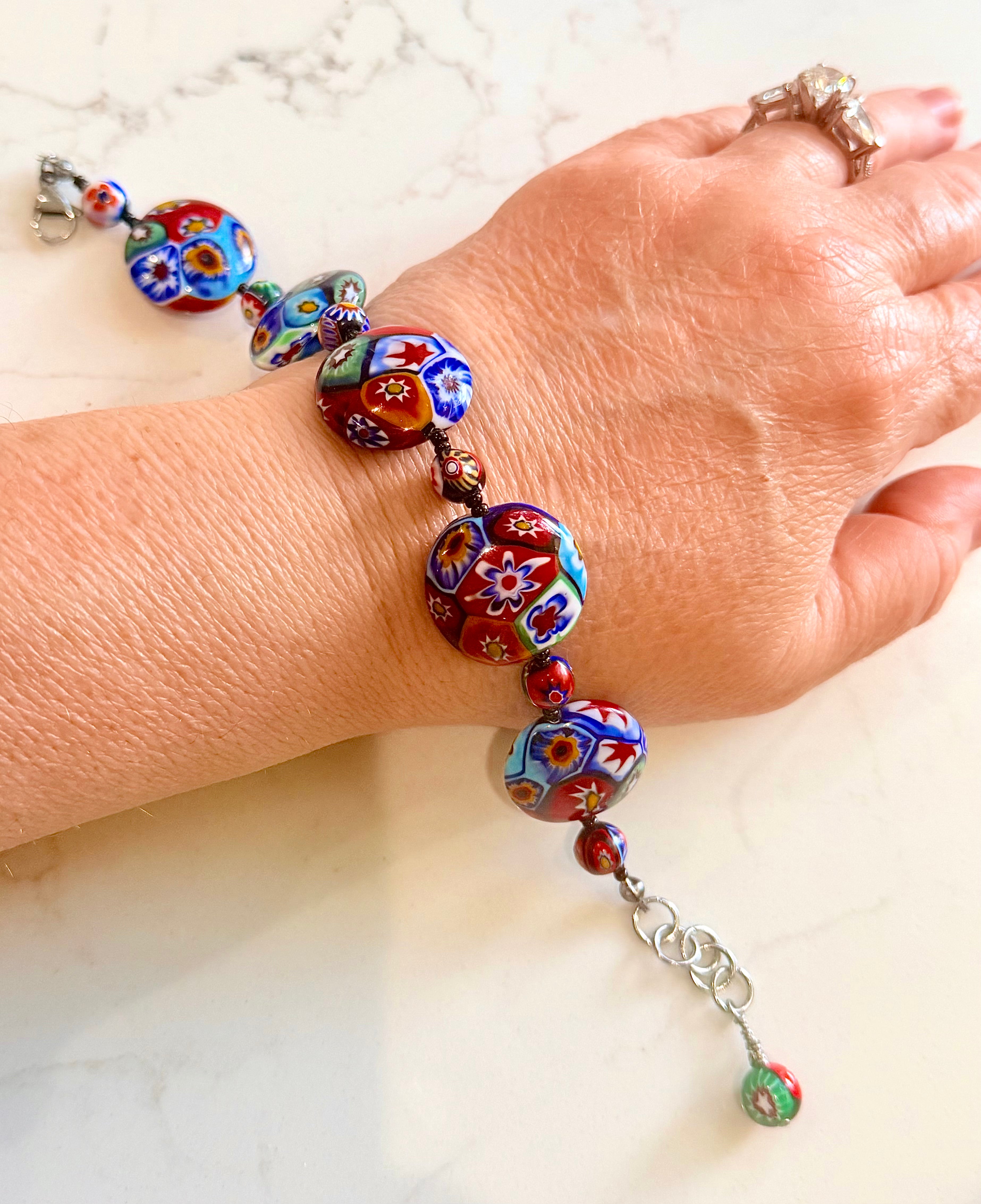 Rosario Leonardi Beaded Coin Shaped Bracelet Featuring Ercole Moretti Red & Blue Flower Patterned  Beads