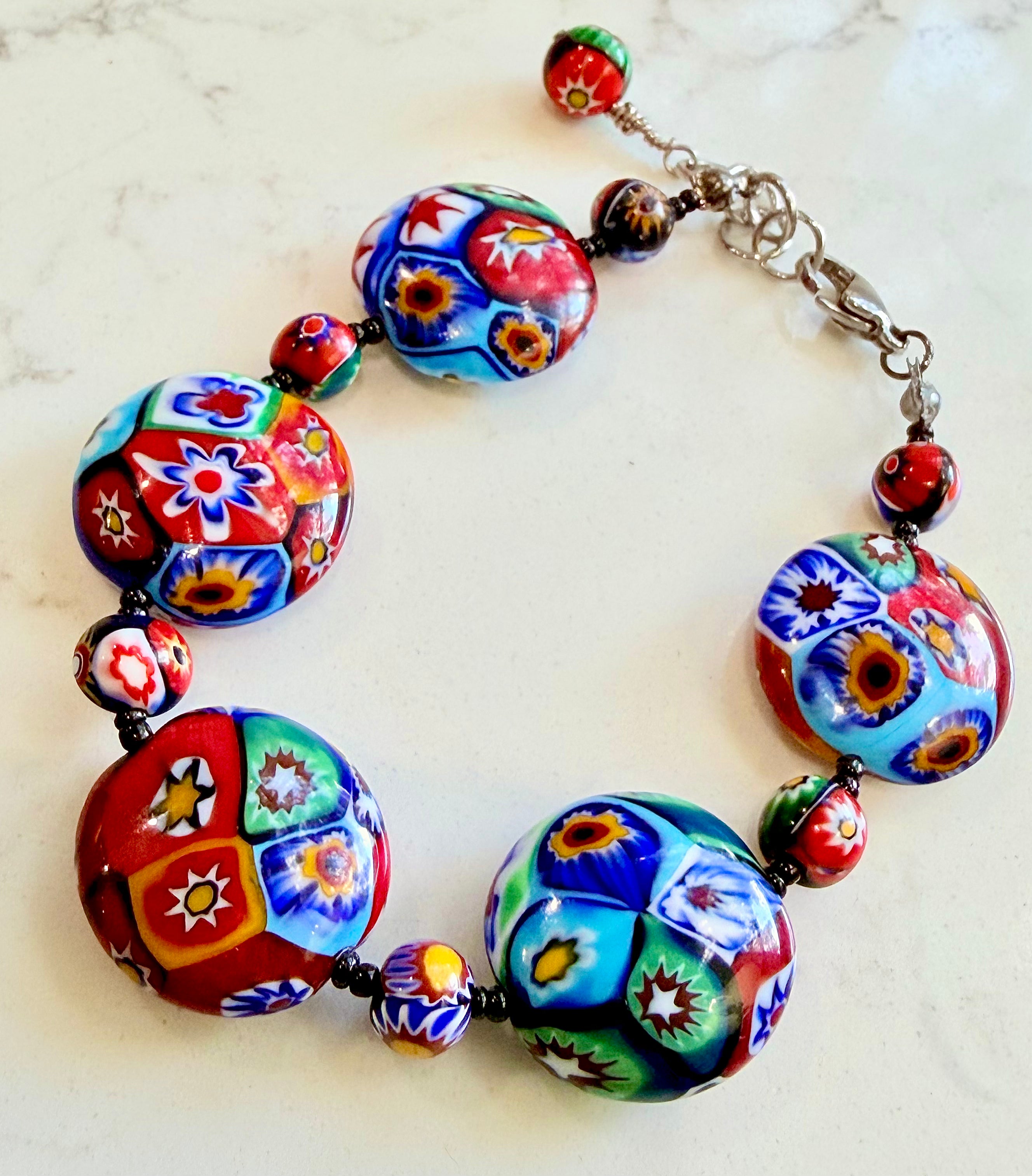 Rosario Leonardi Beaded Coin Shaped Bracelet Featuring Ercole Moretti Red & Blue Flower Patterned  Beads