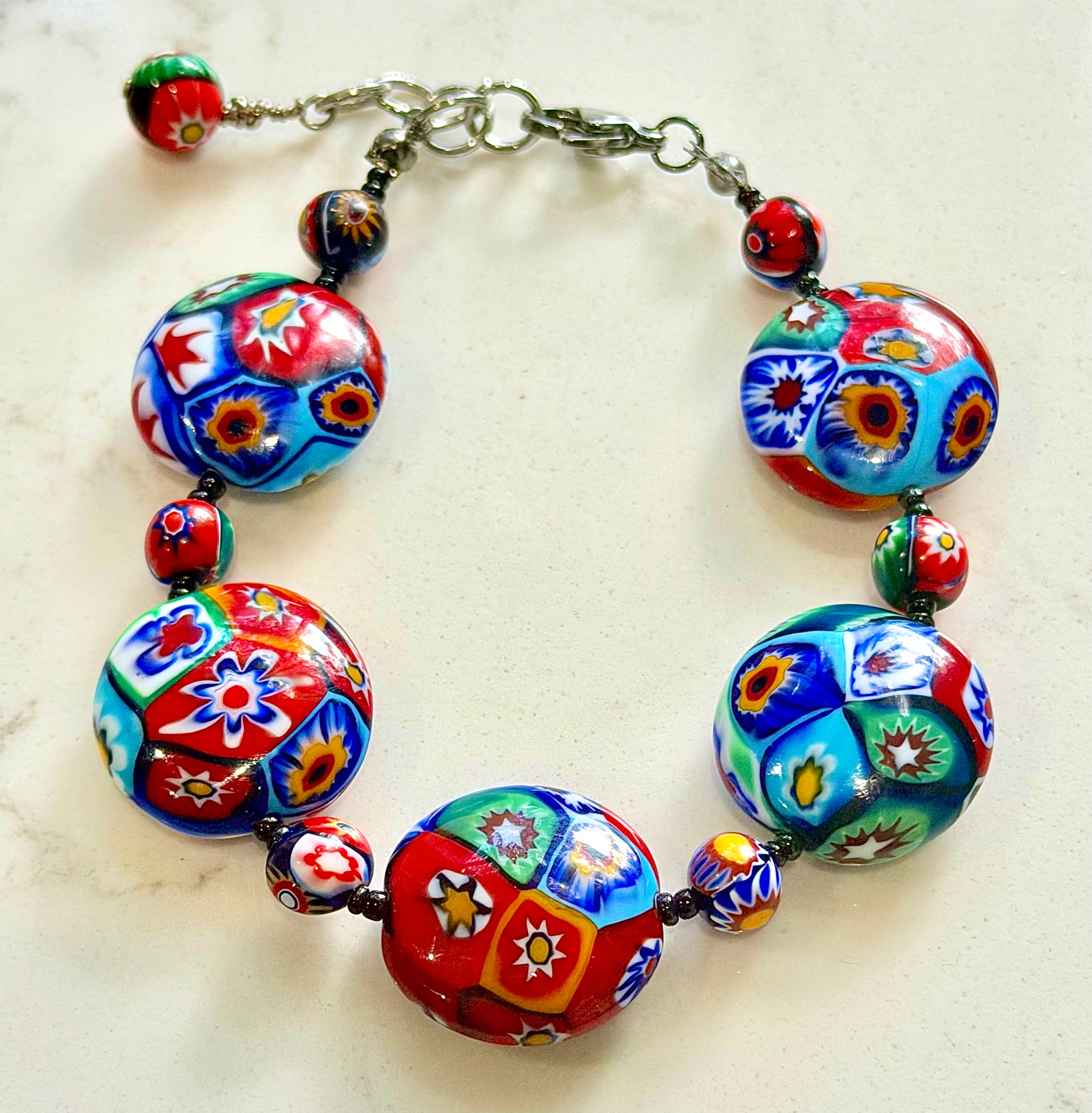 Rosario Leonardi Beaded Coin Shaped Bracelet Featuring Ercole Moretti Red & Blue Flower Patterned  Beads