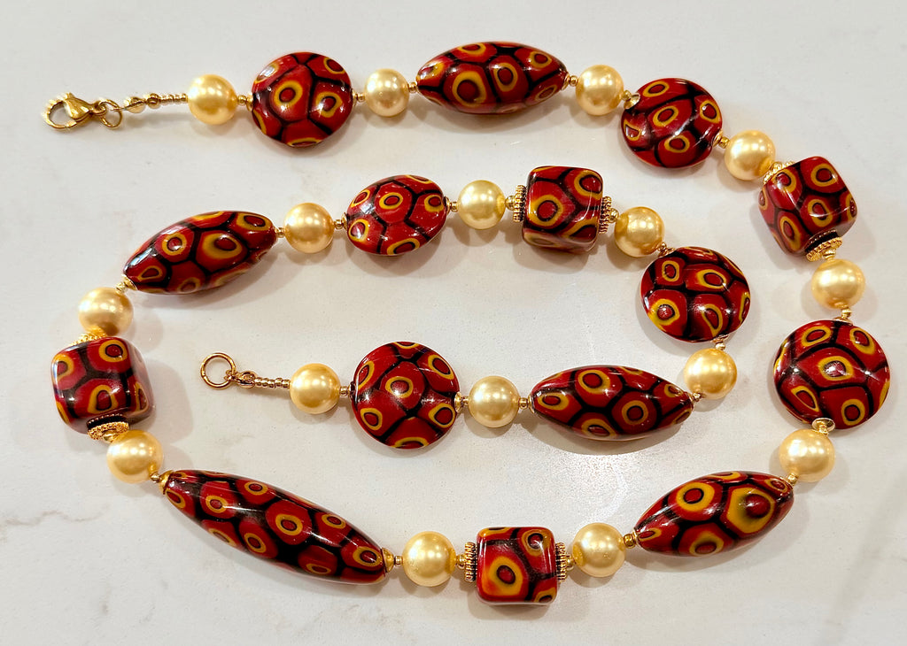 Rosario Leonardi Golden Shell Pearl With Moretti Red, Yellow & Black Beaded Necklace