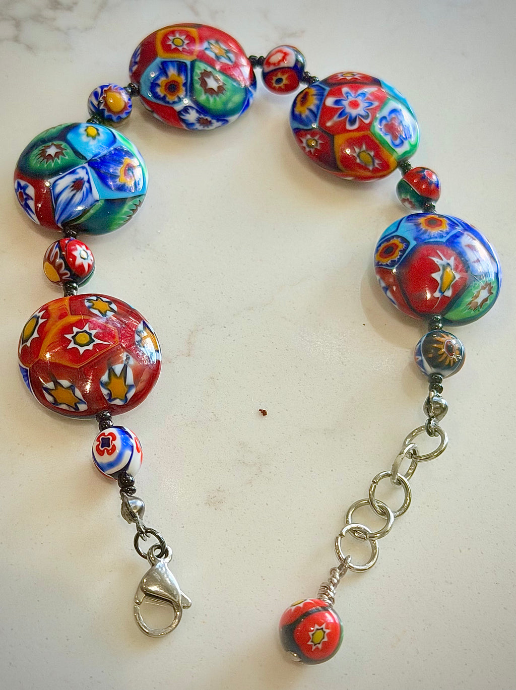 Rosario Leonardi Beaded Coin Shaped Bracelet Featuring Ercole Moretti Red & Blue Flower Patterned  Beads