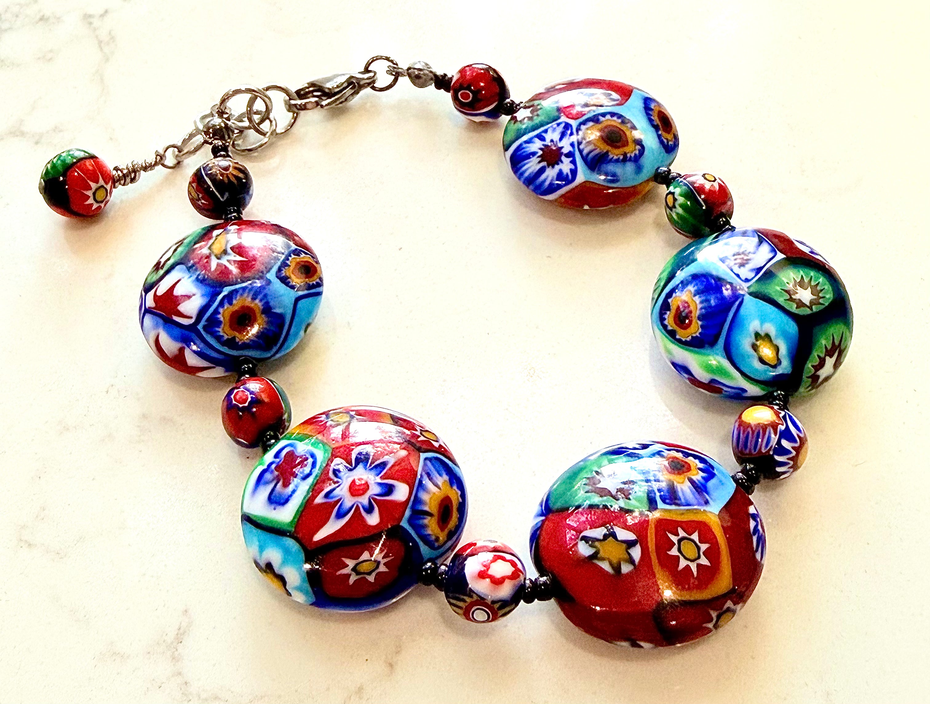 Rosario Leonardi Beaded Coin Shaped Bracelet Featuring Ercole Moretti Red & Blue Flower Patterned  Beads