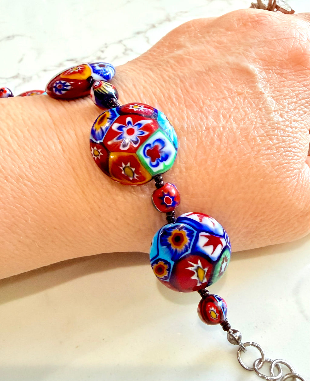 Rosario Leonardi Beaded Coin Shaped Bracelet Featuring Ercole Moretti Red & Blue Flower Patterned  Beads