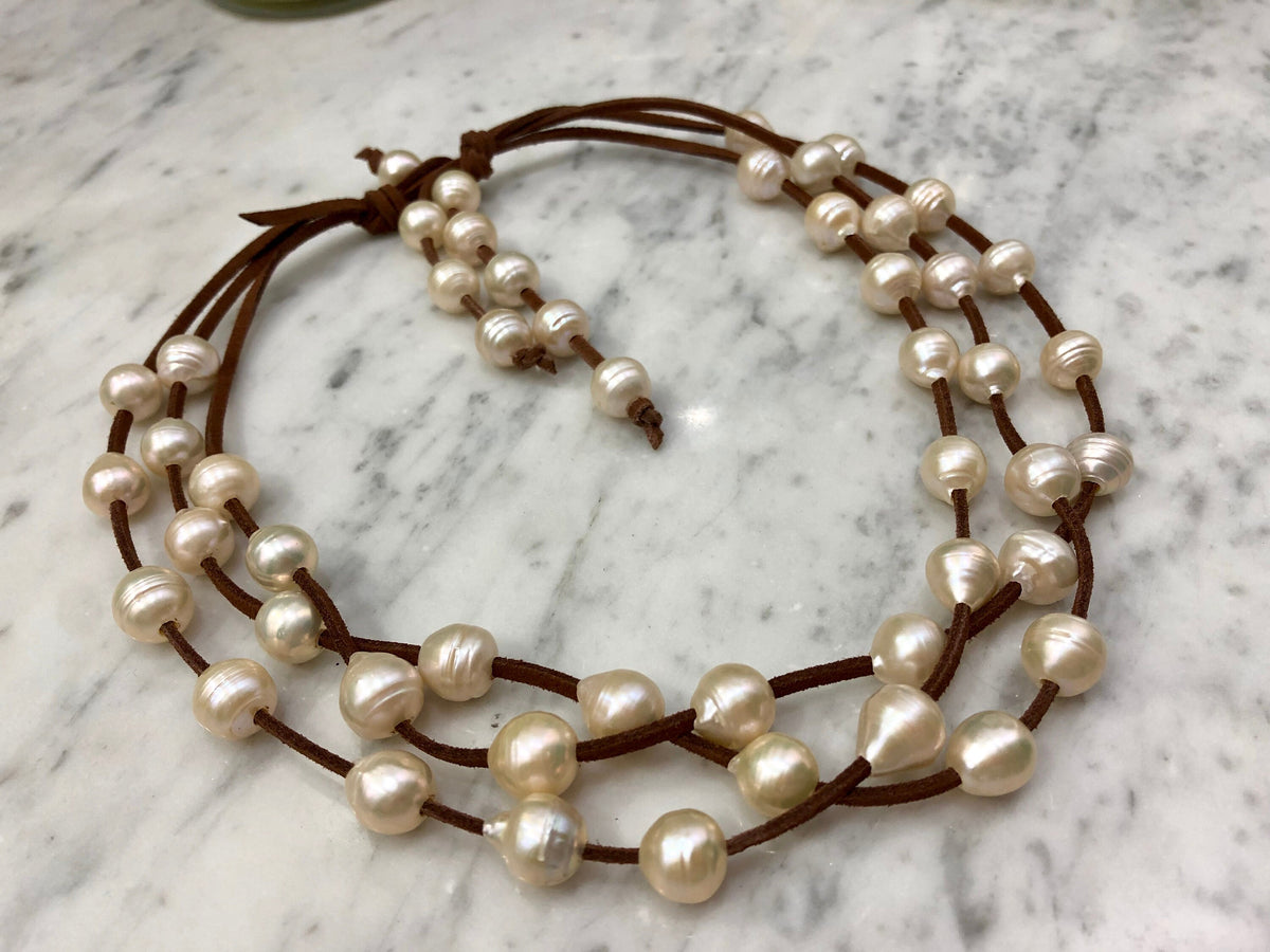 3 Strand Huge freshwater pearls on vegan suede.