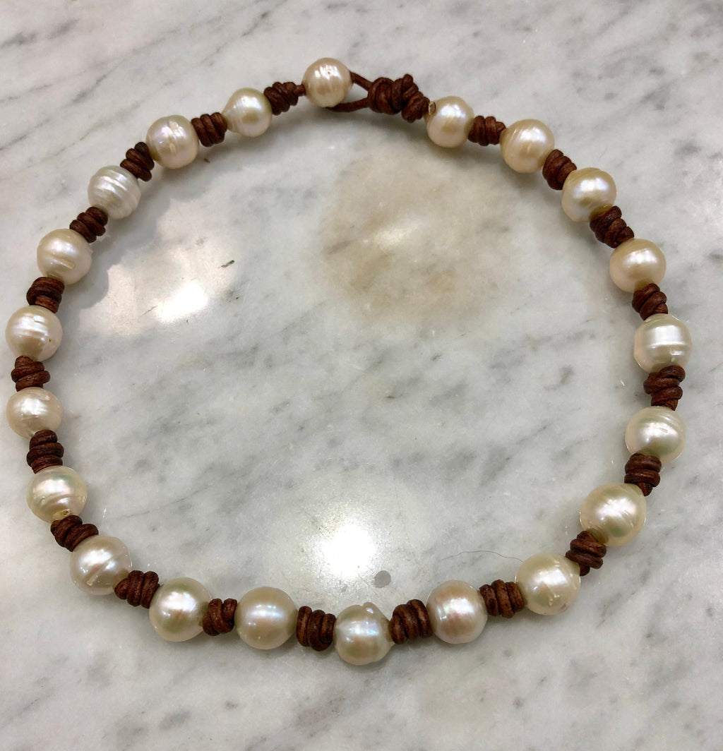 White Freshwater Pearls on Knotted Brown Leather