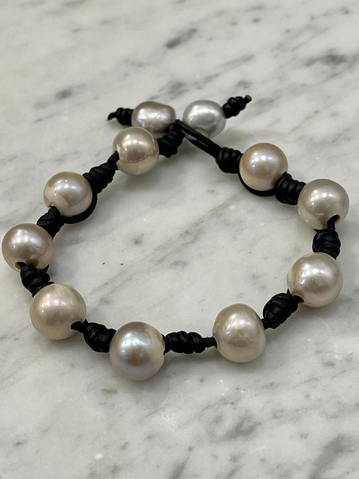 12mm Iridescent Silver Pearl and Knotted Black Leather Bracelet