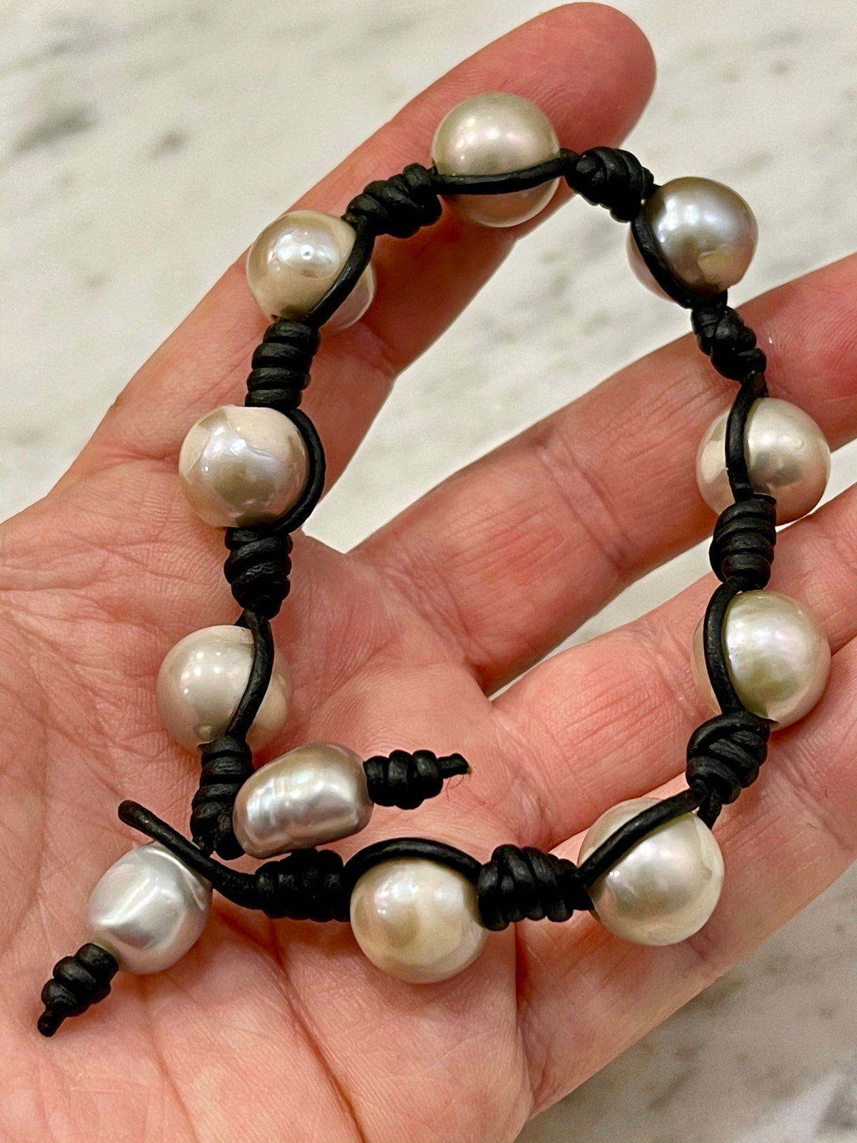 12mm Iridescent Silver Pearl and Knotted Black Leather Bracelet