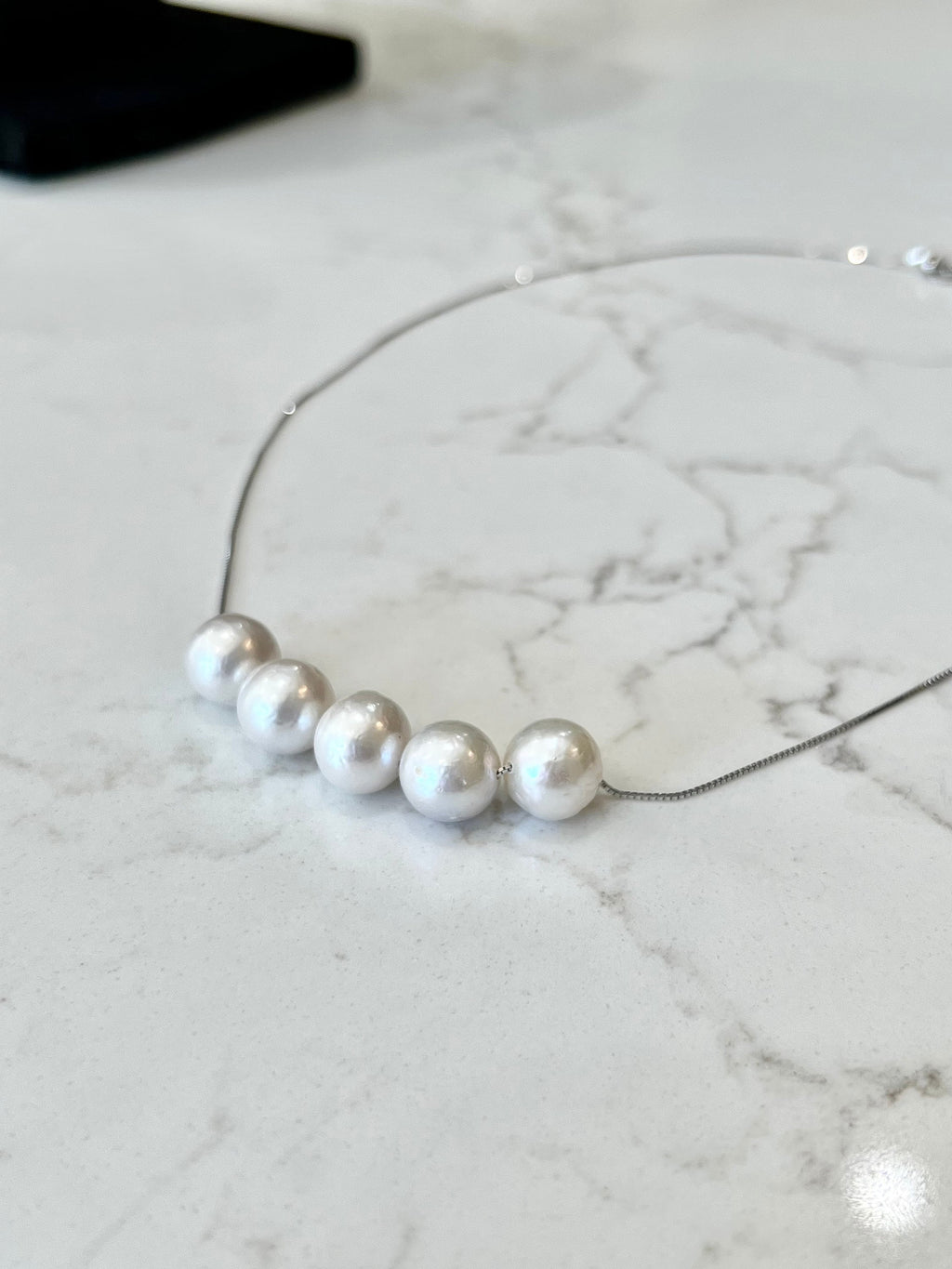 Five Floating White Pearls  on 17.5” Sterling Silver necklace