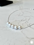 Five Floating White Pearls  on 17.5” Sterling Silver necklace