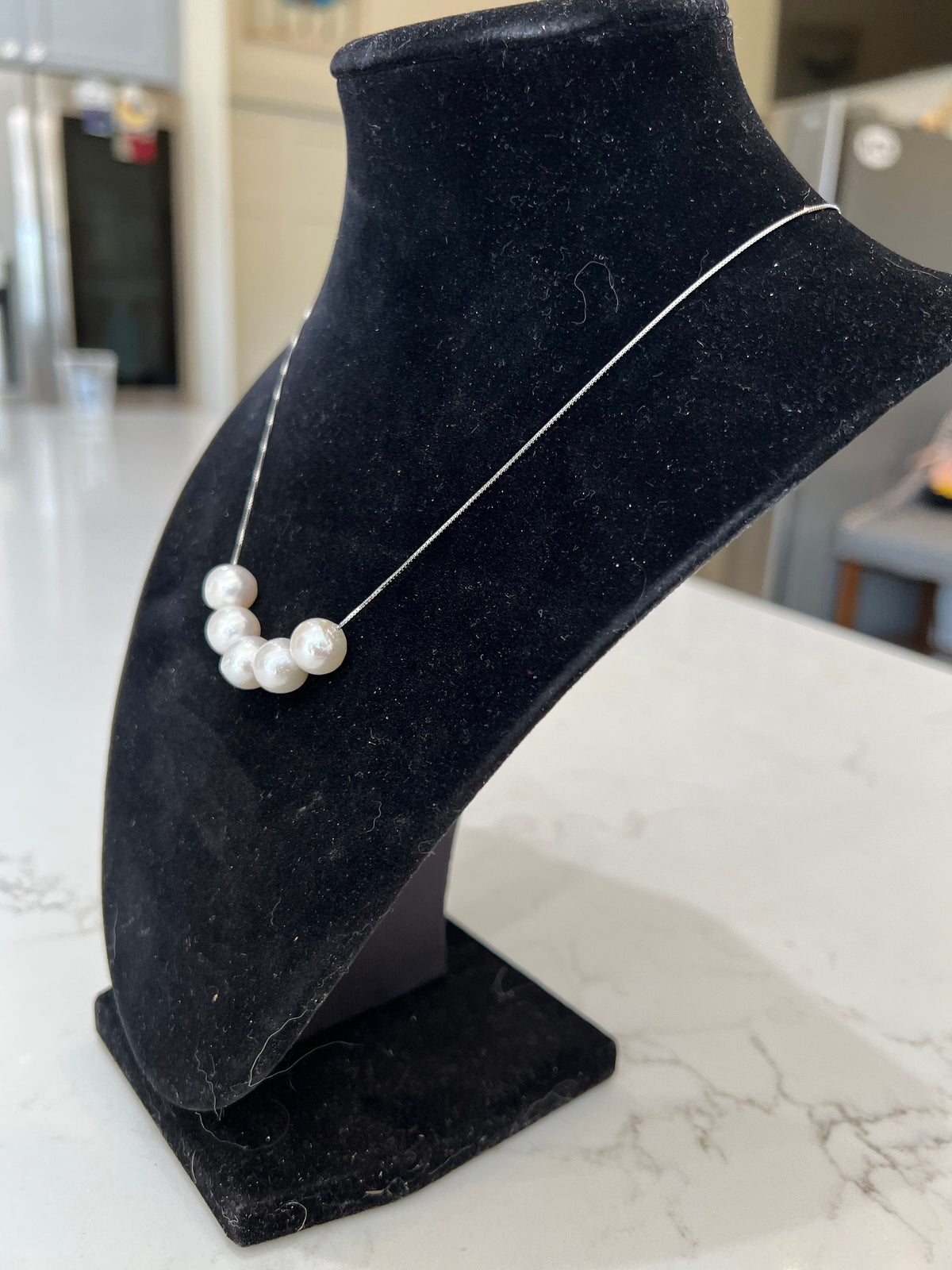 Five Floating White Pearls  on 17.5” Sterling Silver necklace