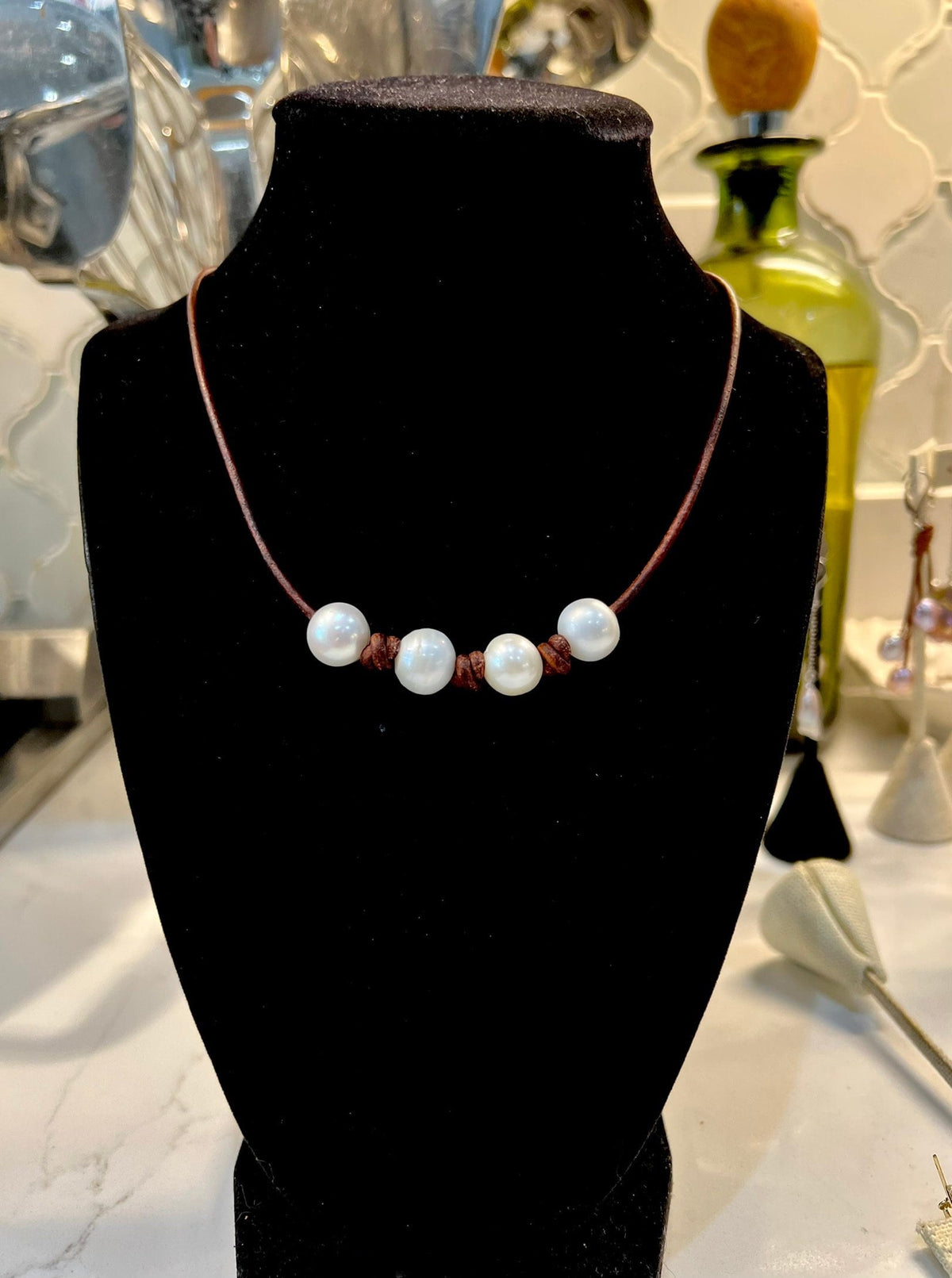 Four Pearl Necklace on knotted brown leather