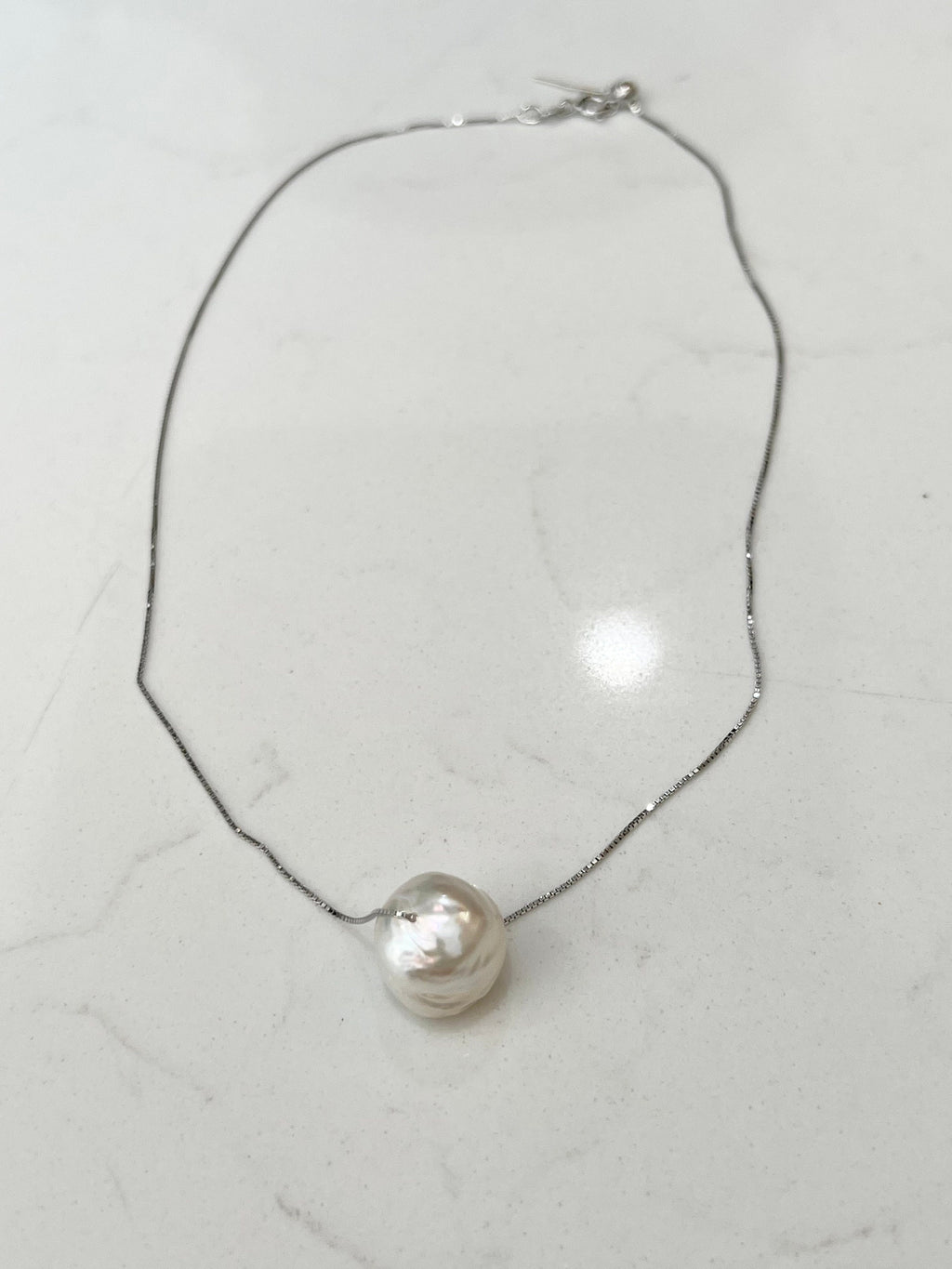 Flameball Giant White Baroque Floating Pearl  on 17.5” Sterling Silver necklace