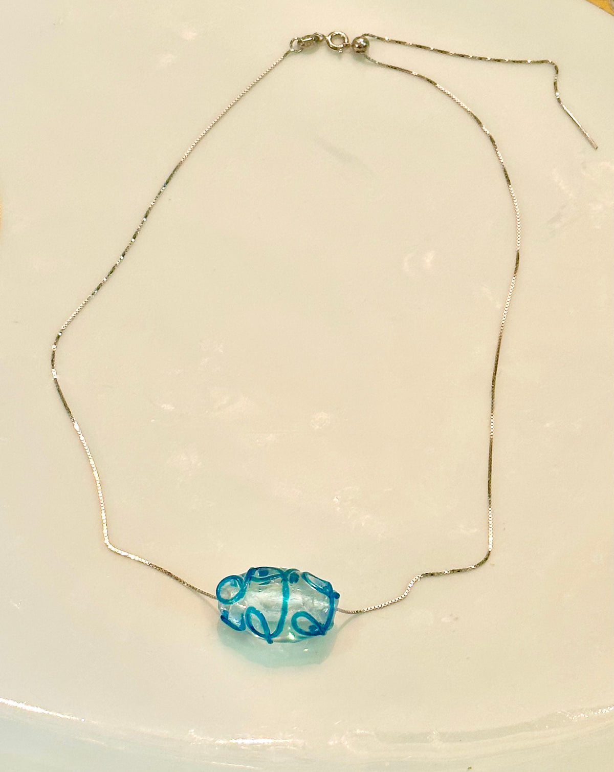 Hand-Blown Oval Clear and Ocean Blue Glass on Sterling Silver Chain