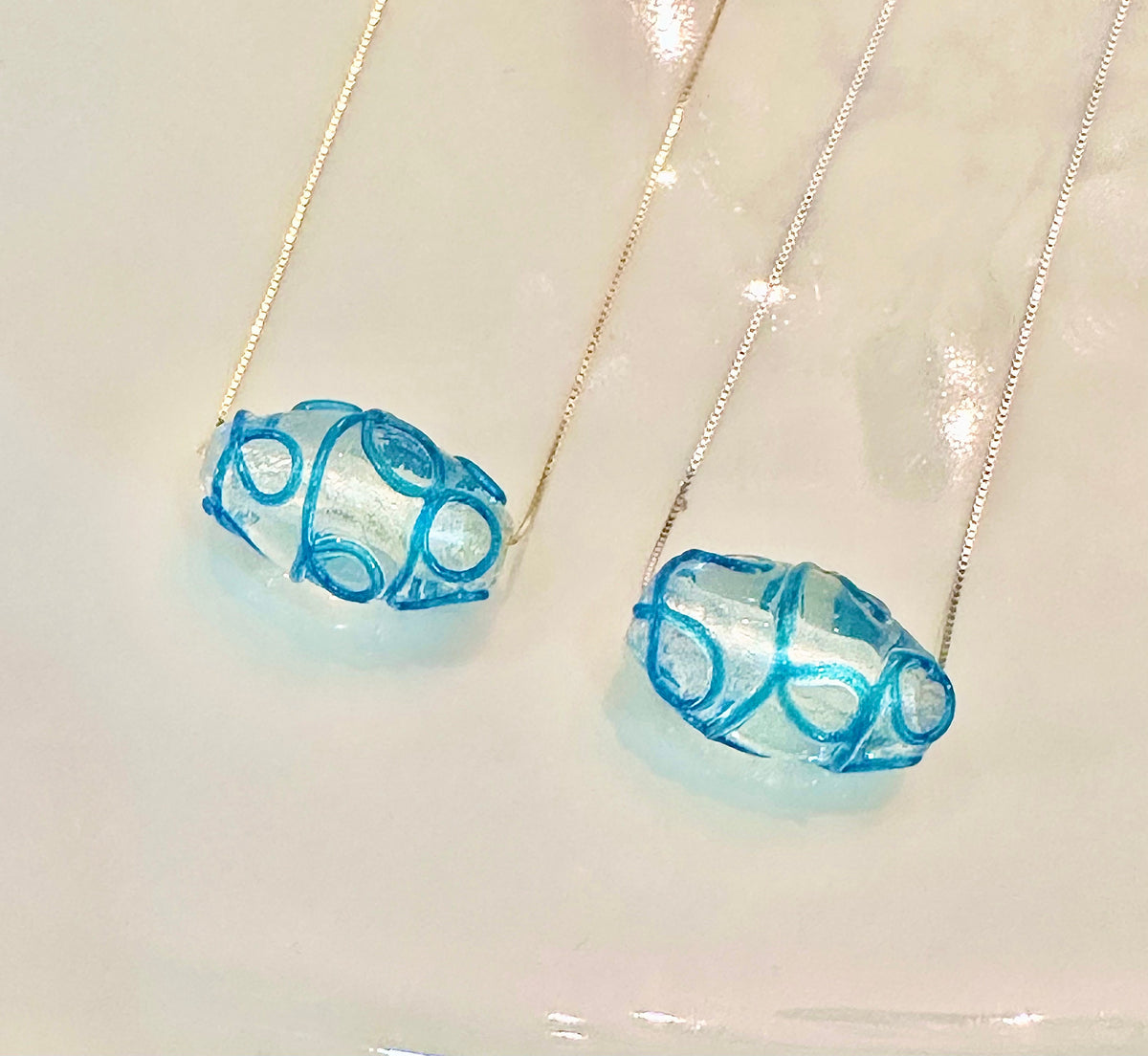 Hand-Blown Oval Clear and Ocean Blue Glass on Sterling Silver Chain