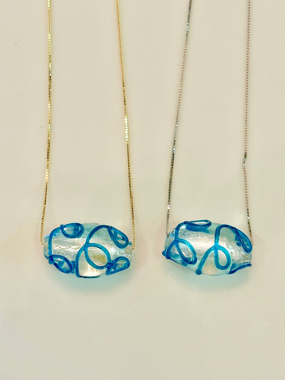 Hand-Blown Oval Clear and Ocean Blue Glass on Sterling Silver Chain