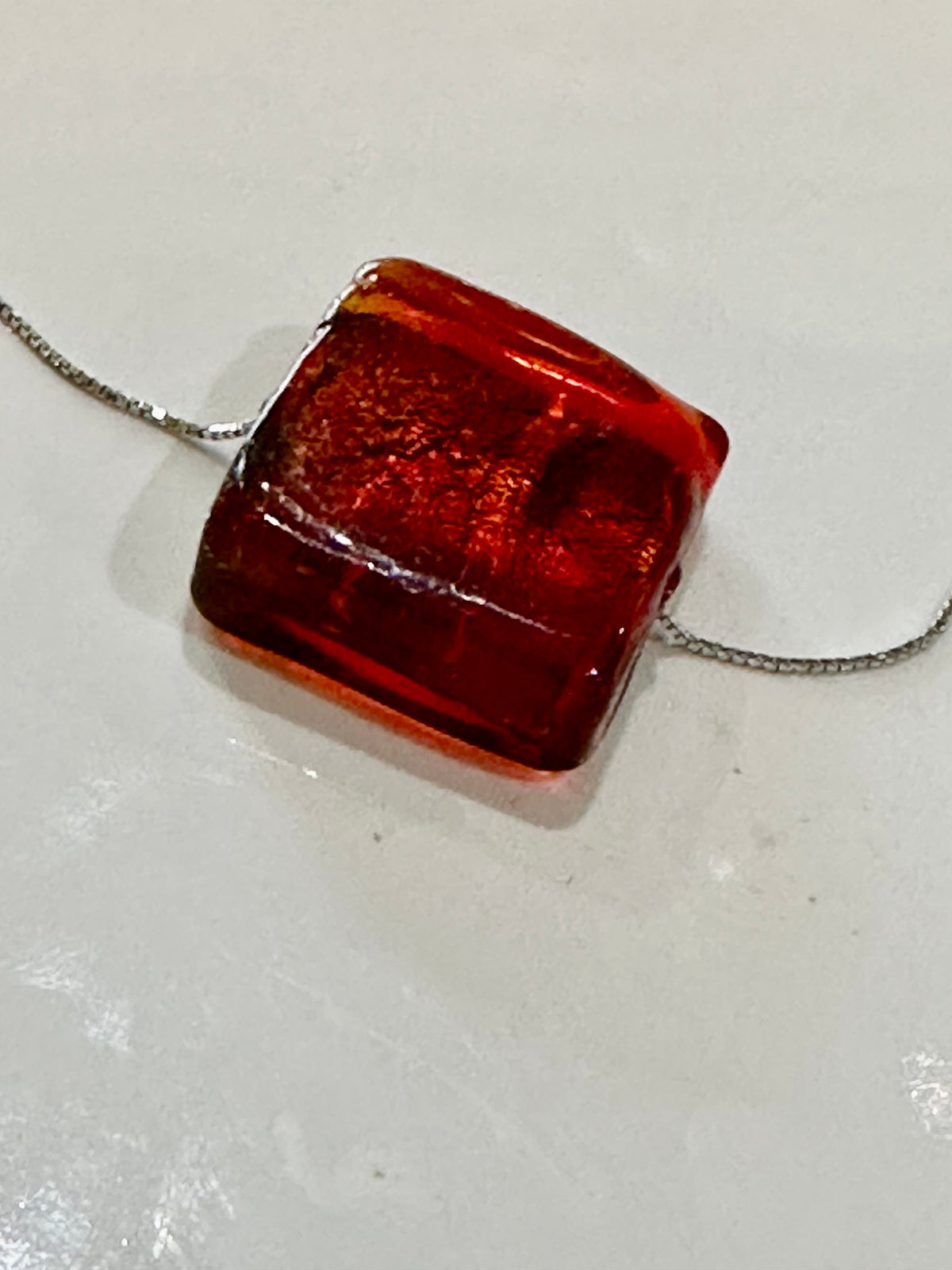 Iridescent Red Handmade Murano Glass pendant strung on 925 Sterling Adjustable Chain