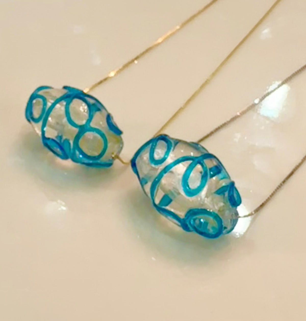 Hand-Blown Oval Clear and Ocean Blue Glass on Sterling Silver Chain