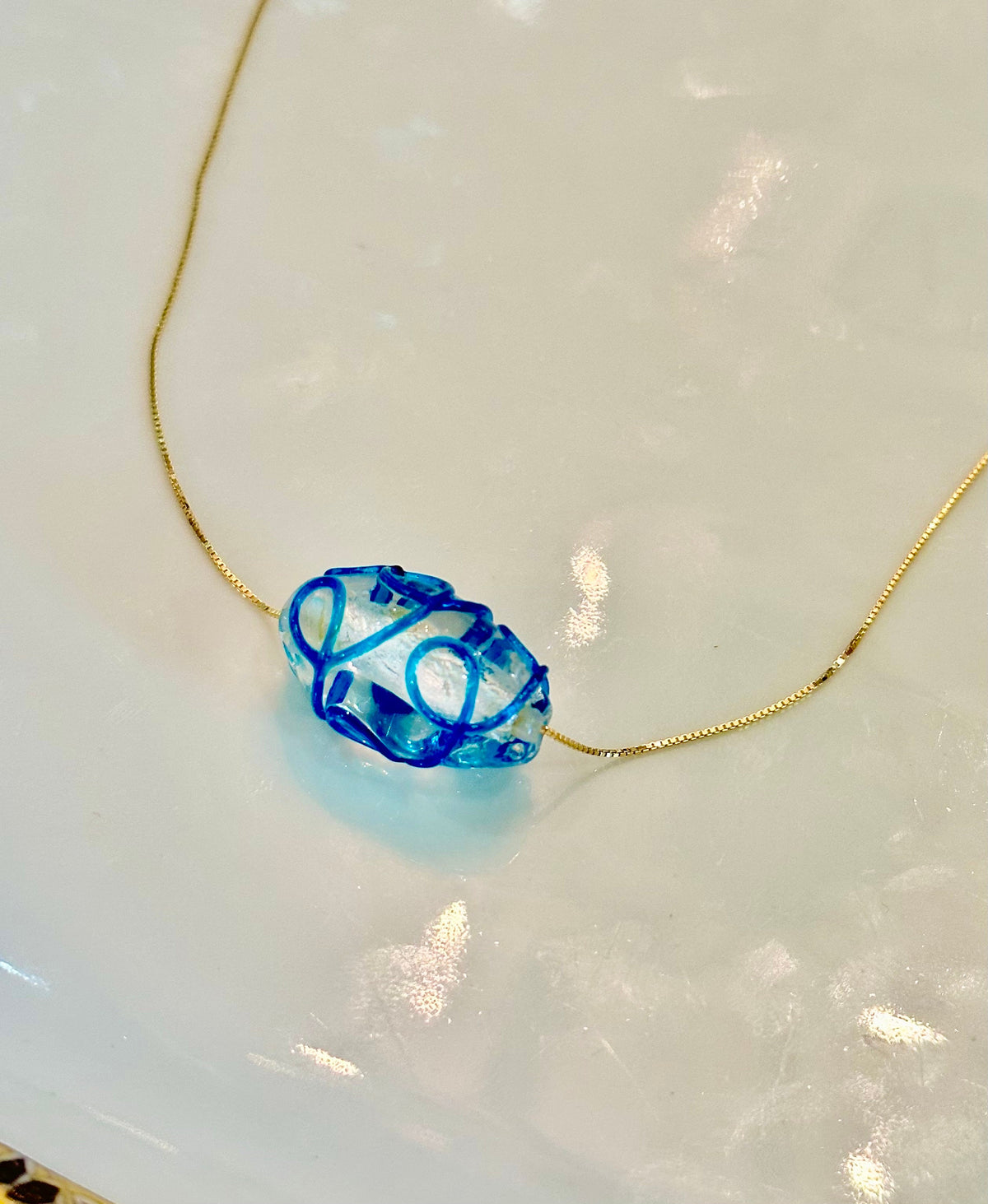 Hand-Blown Oval Clear and Ocean Blue Glass on Sterling Silver Chain