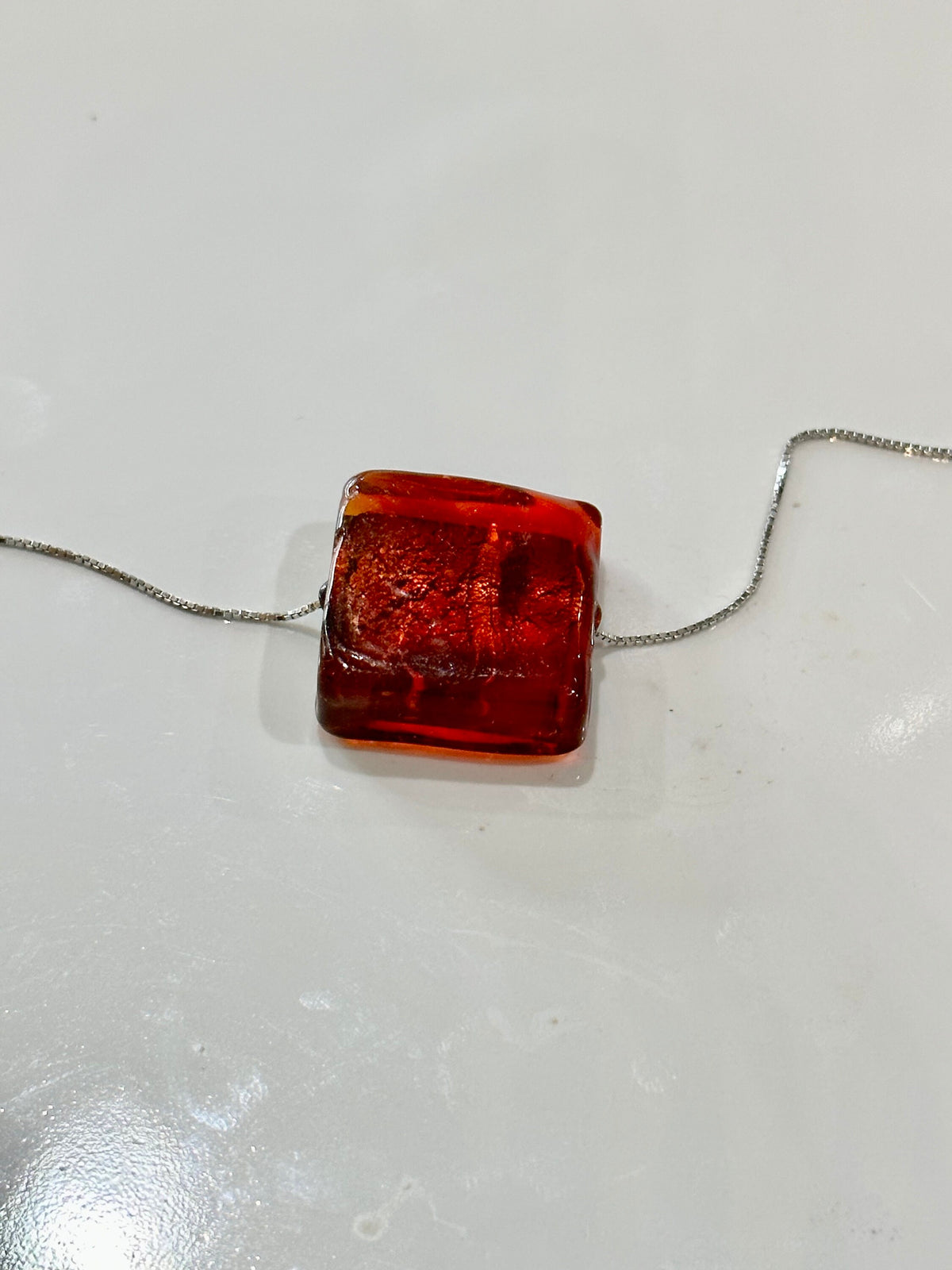 Iridescent Red Handmade Murano Glass pendant strung on 925 Sterling Adjustable Chain