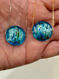 Handmade Iridescent Sky Blue Swirled Murano Glass on Sterling Chain