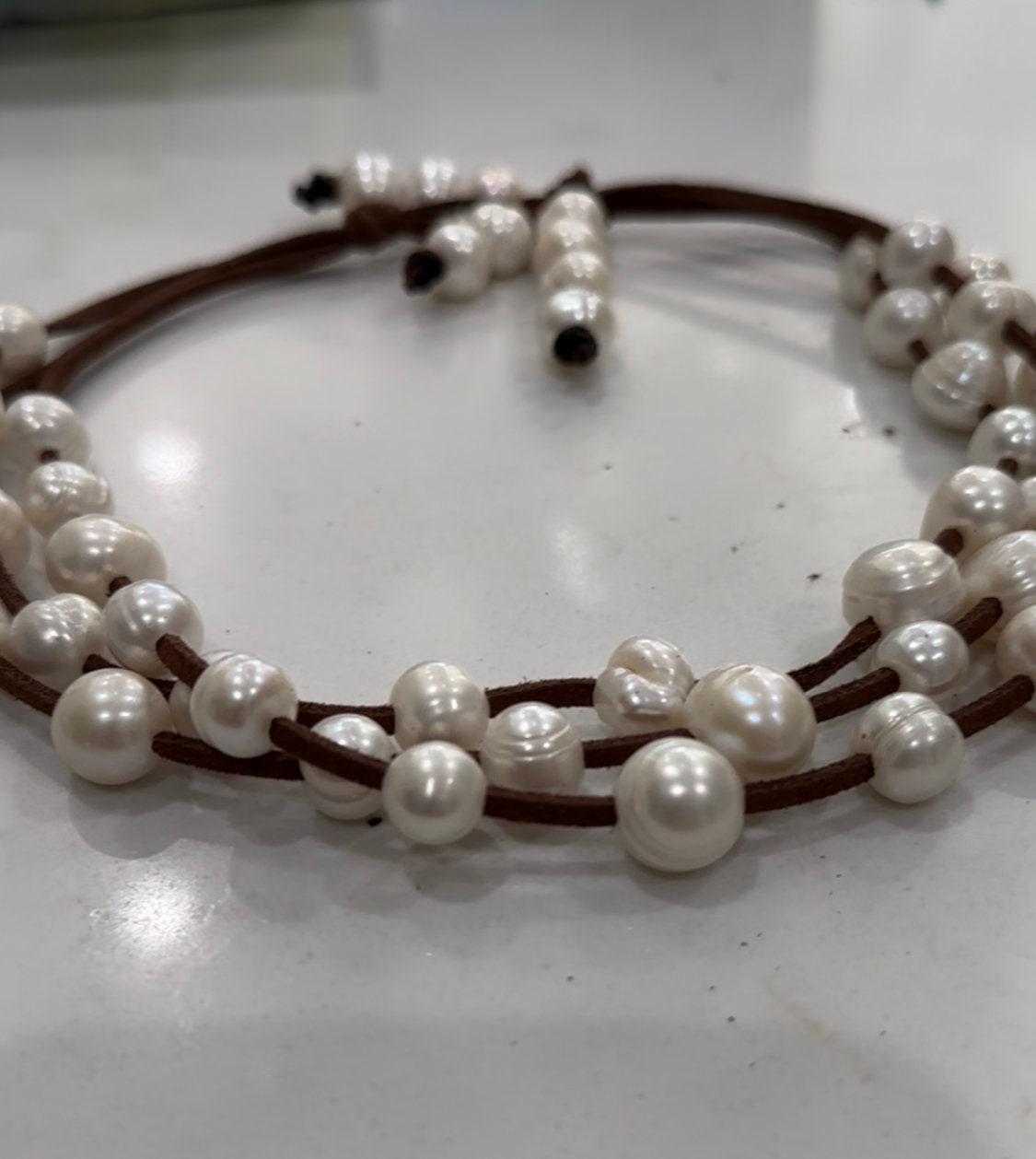 3 Strand freshwater White Pearls and suede necklace