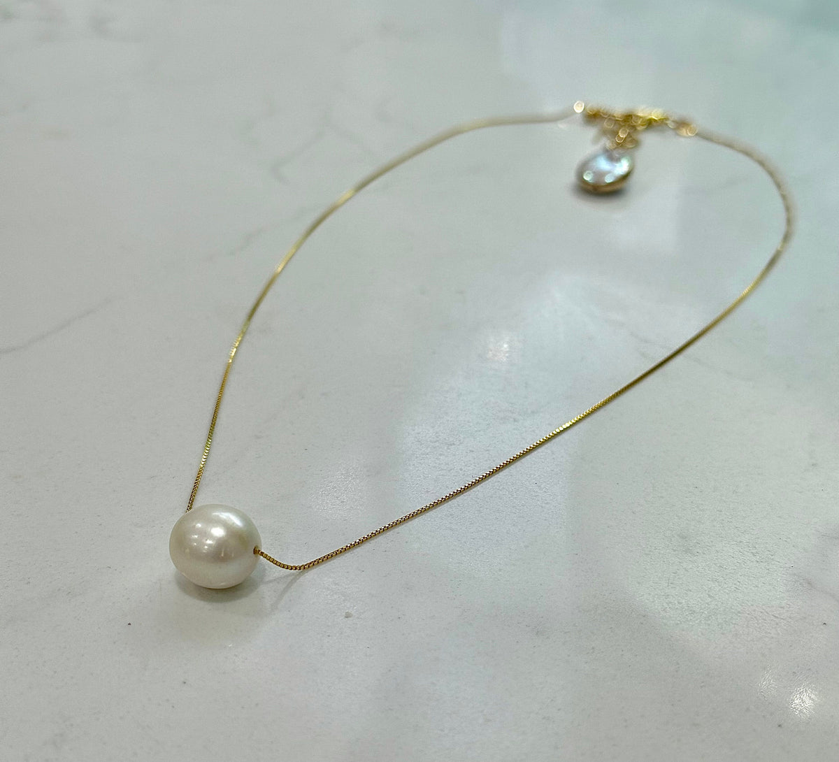 Sterling Silver Oval Pearl Necklace: Adjustable Choker to 18”