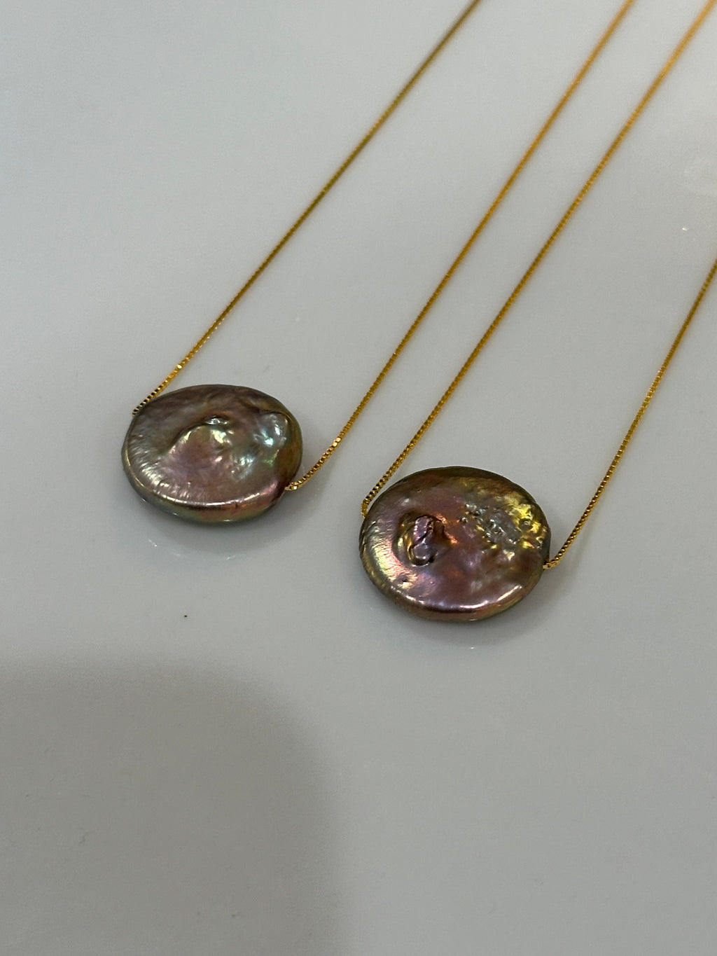 Sterling Silver Chain with a floating Iridescent Purple or Silver Coin Pearl