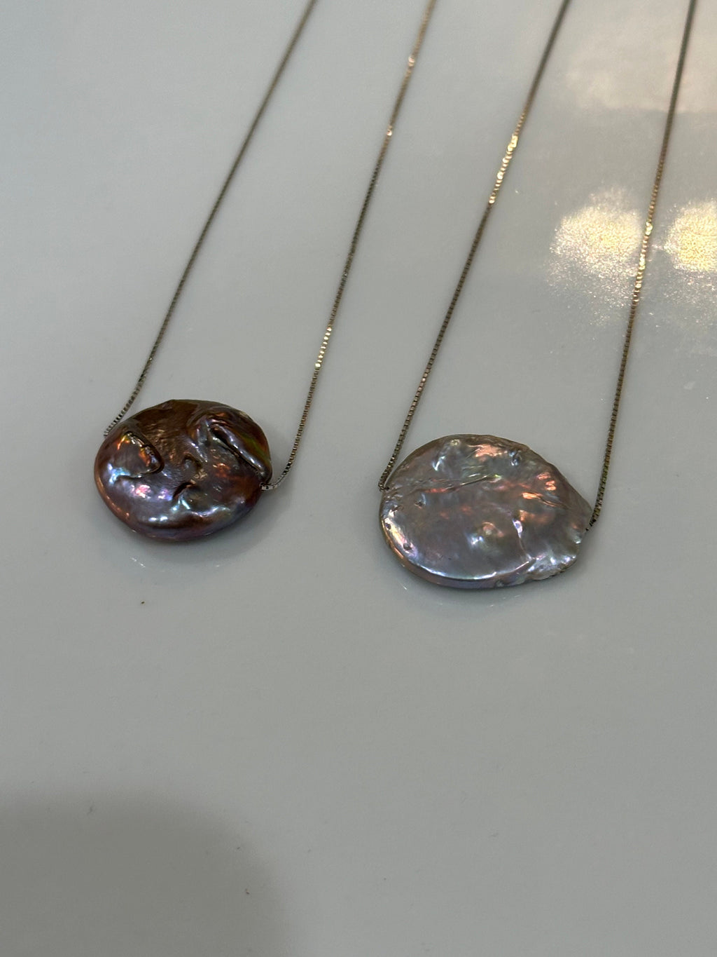 Sterling Silver Chain with a floating Iridescent Purple or Silver Coin Pearl