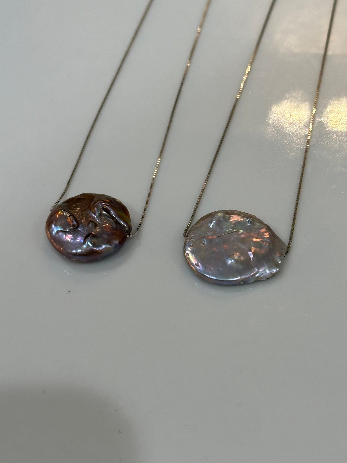 Sterling Silver Chain with a floating Iridescent Purple or Silver Coin Pearl