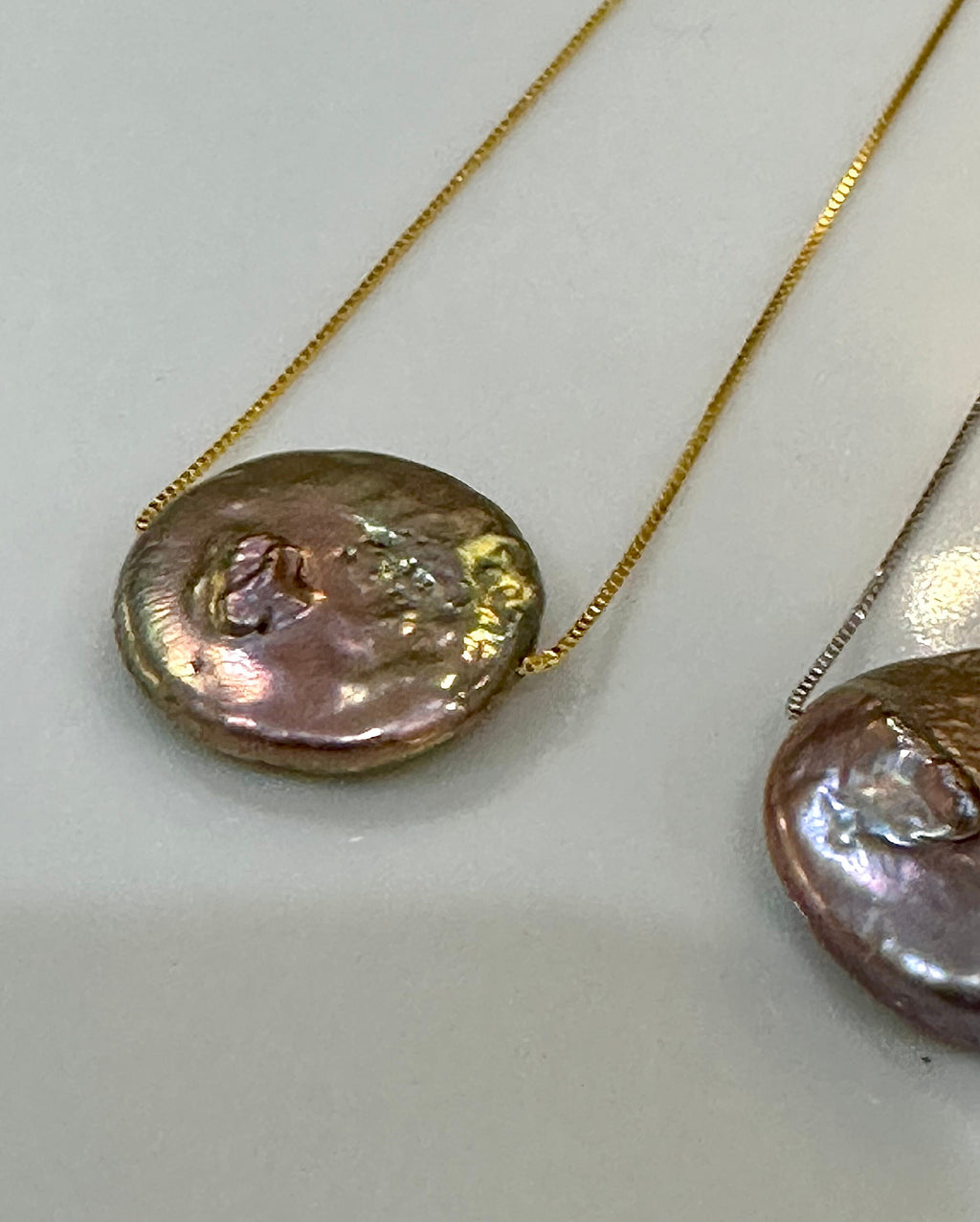 Sterling Silver Chain with a floating Iridescent Purple or Silver Coin Pearl