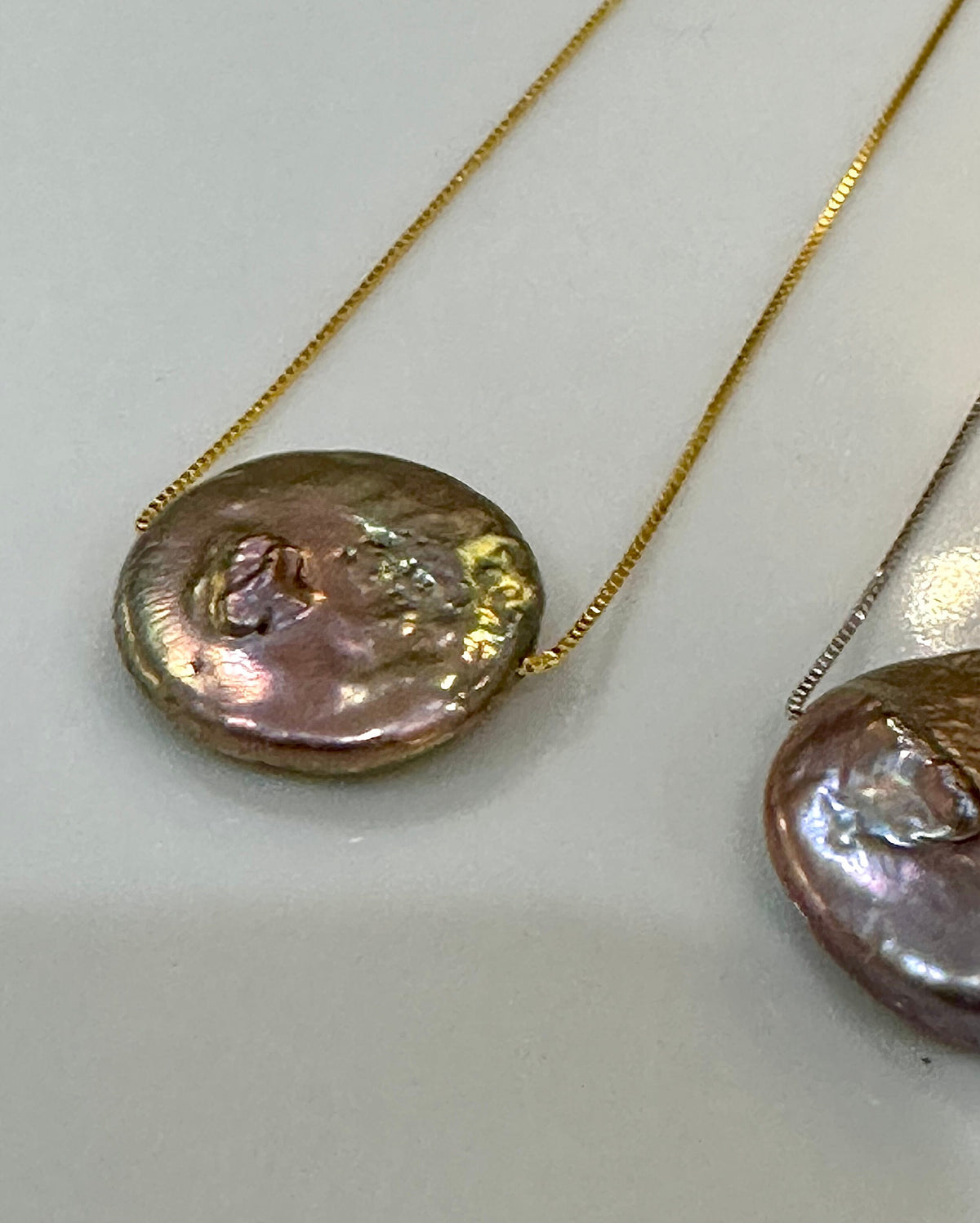 Sterling Silver Chain with a floating Iridescent Purple or Silver Coin Pearl