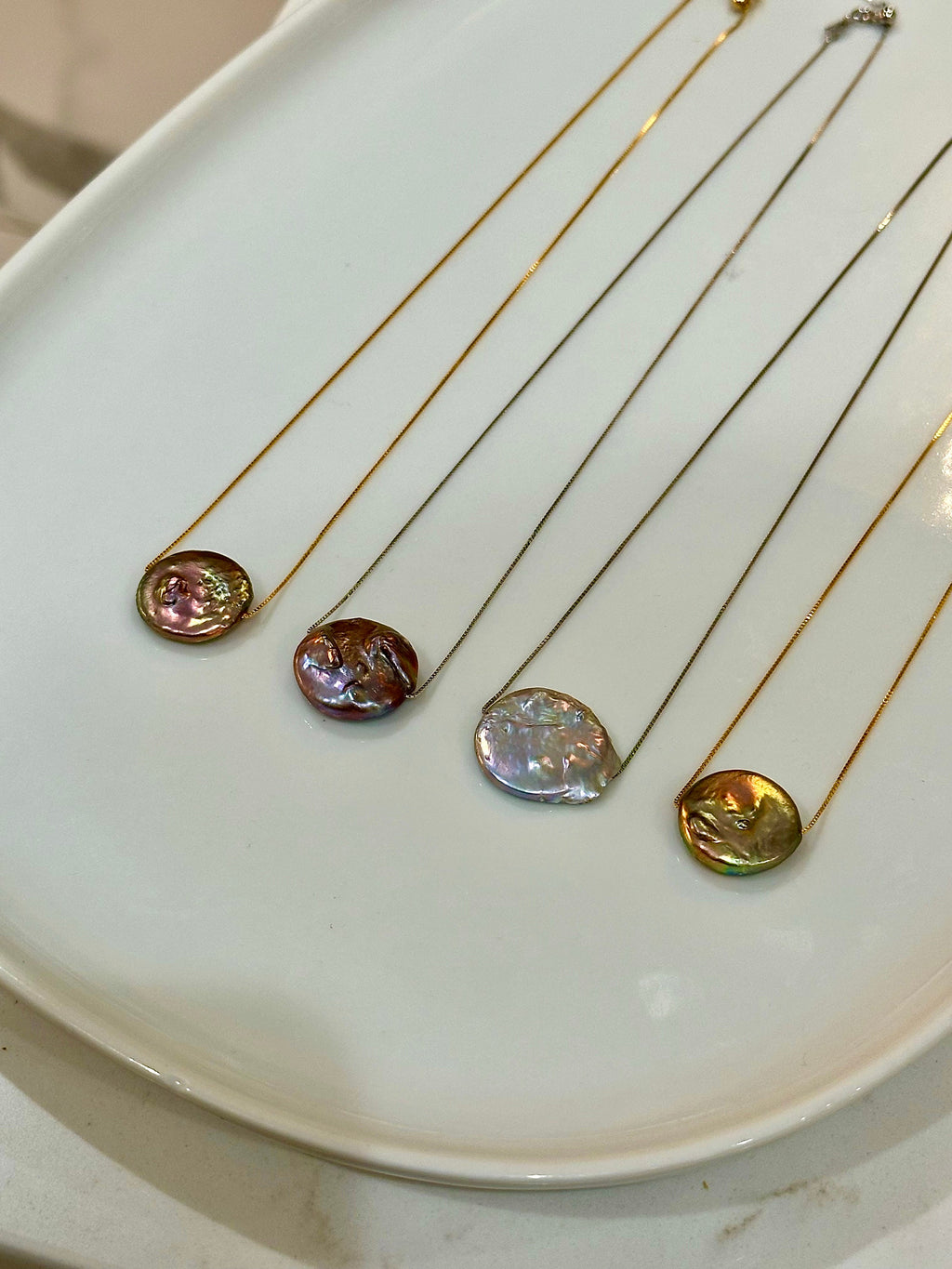Choose between silver iridescent, purple iridescent and gold greenish iridescent coin pearls on silver 925 or gold clad sterling 925 adjustable chain.