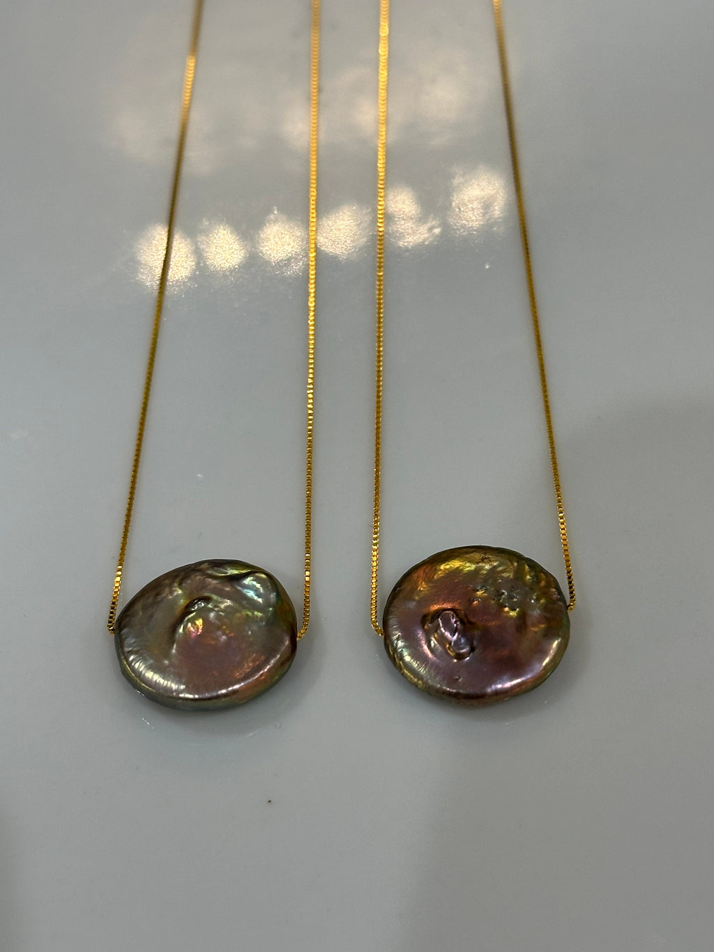Sterling Silver Chain with a floating Iridescent Purple or Silver Coin Pearl