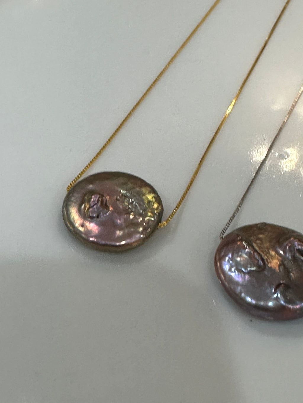 Sterling Silver Chain with a floating Iridescent Purple or Silver Coin Pearl
