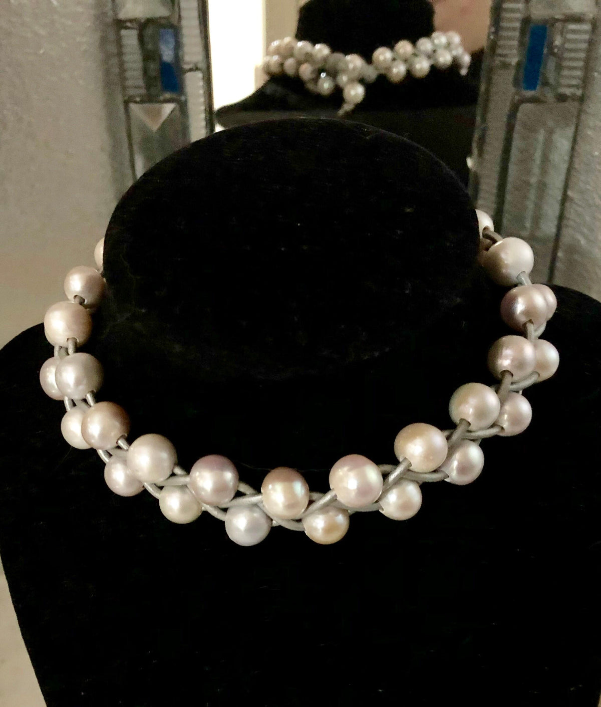 White pearls with silver leather choker