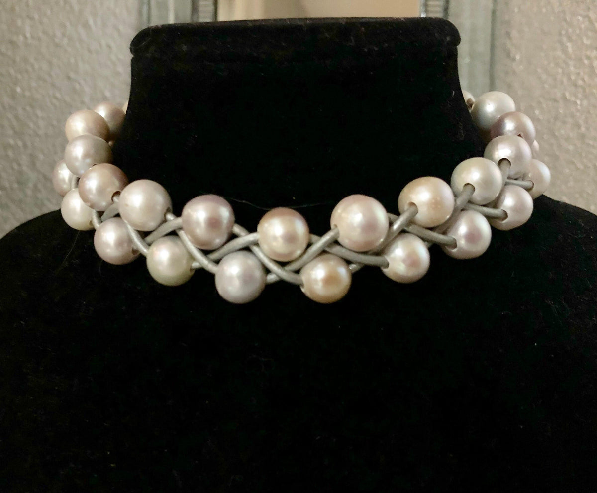 White pearls with silver leather choker