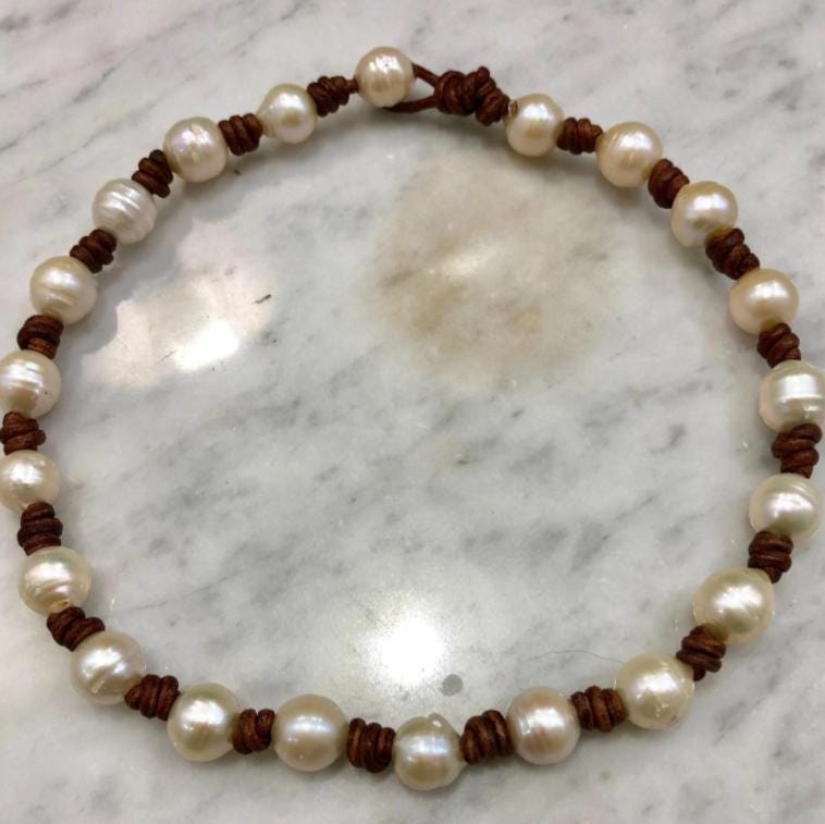 White Freshwater Pearls on Knotted Brown Leather