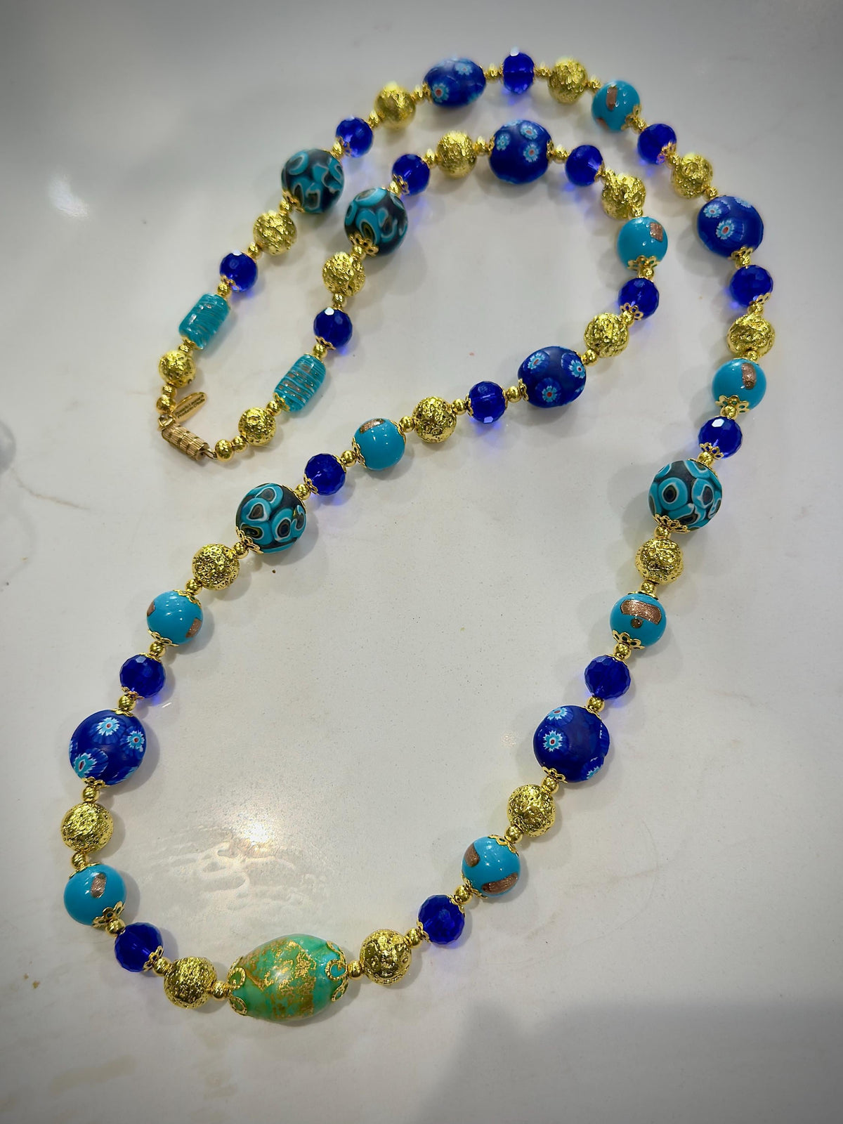 Uncirculated Vintage Millefiori Murano Glass Necklace Made From Gold, Cobalt, and Aqua Hues.