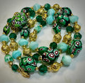 Vintage Murano Millefiori Glass Necklace: Green Oval Beads, Gold Lava