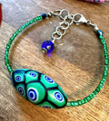 Rosario Leonardi Green Bracelet: Vintage Seed Beads, Ercole Moretti Focal Bead