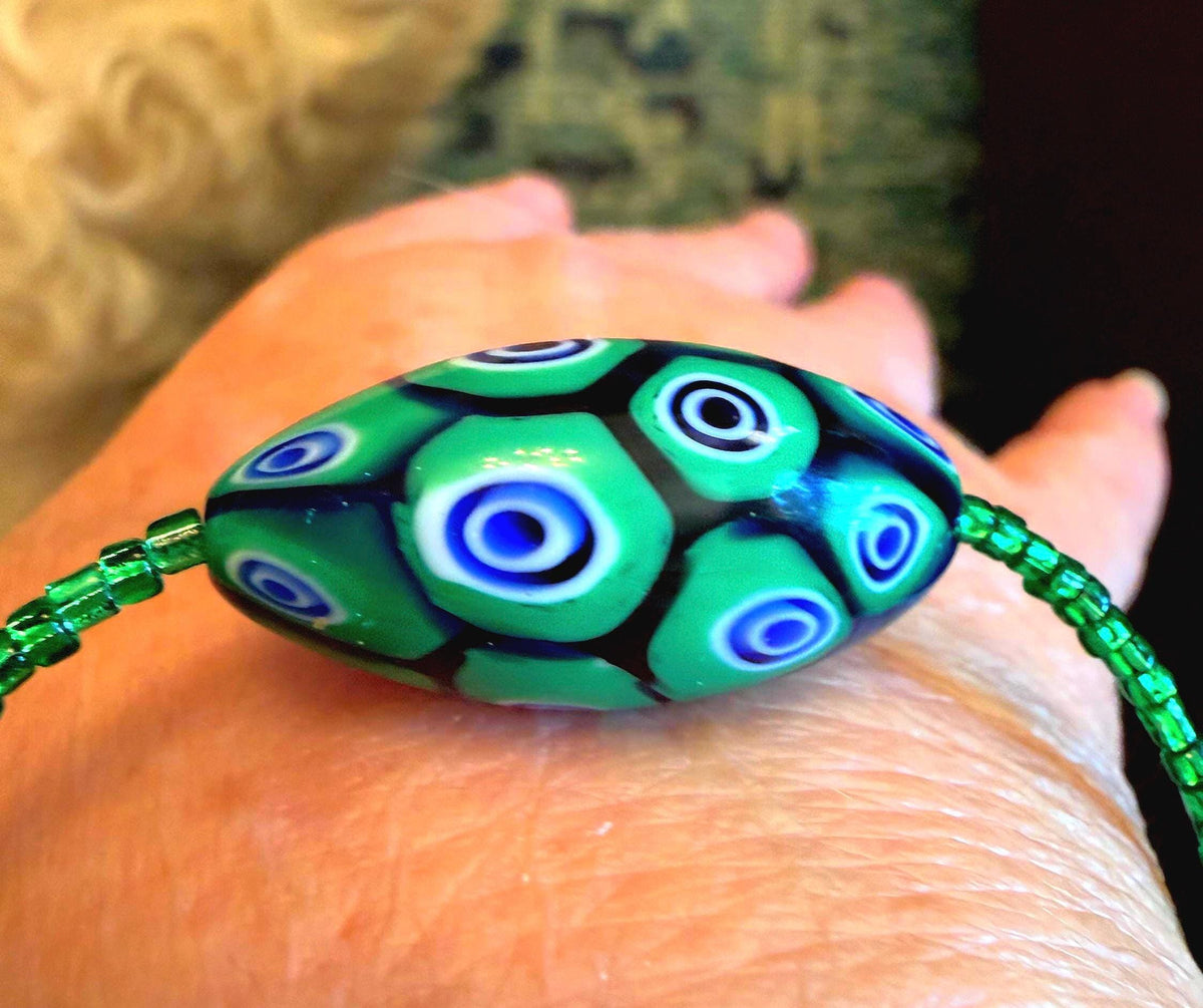 Rosario Leonardi Green Bracelet: Vintage Seed Beads, Ercole Moretti Focal Bead