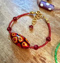 Rosario Leonardi Red Bracelet: Vintage Seed Beads, Ercole Moretti Focal Bead